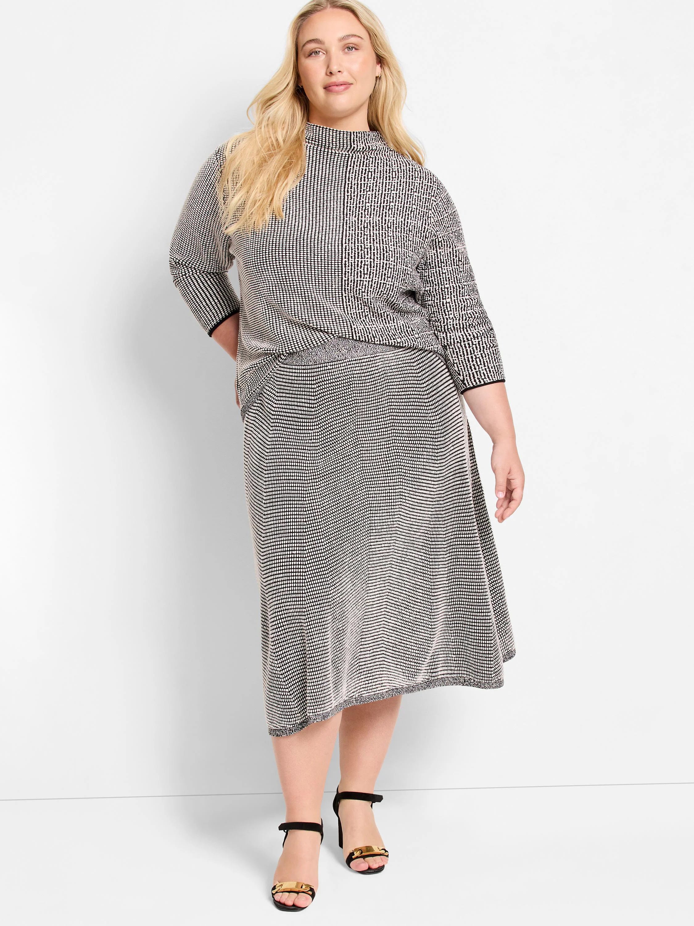 Black & off-white pixel knit midi skirt, A-line, with a prominent chevron pattern.