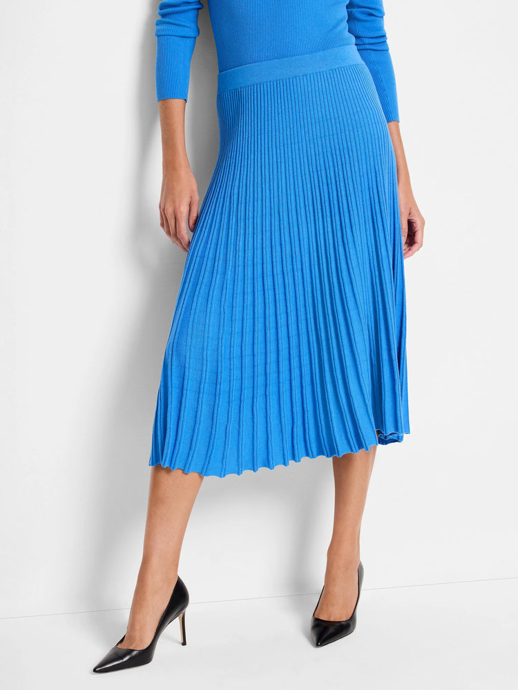 Bright blue ribbed midi skirt with a flat waistband and a scalloped hem.