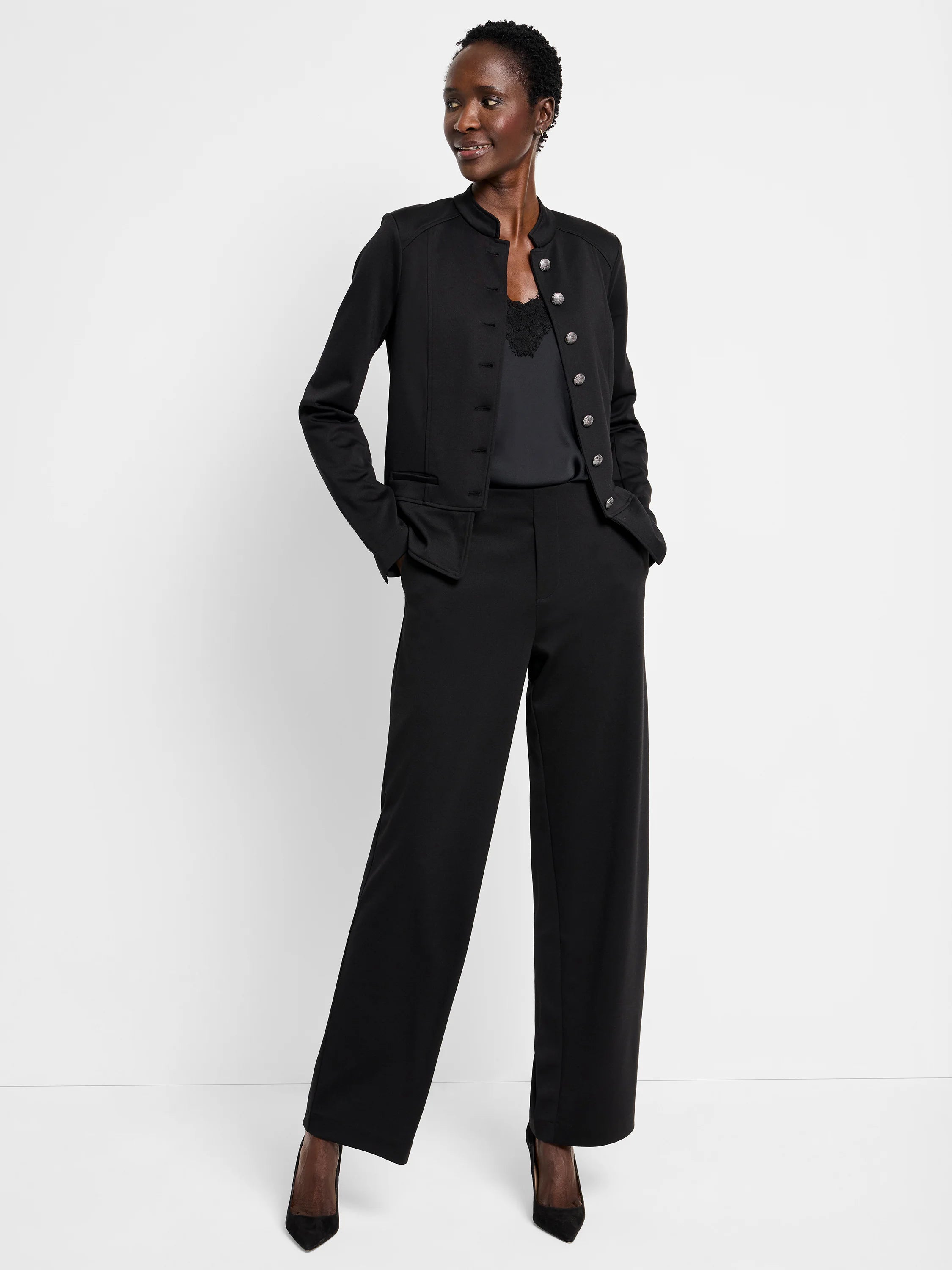 Black wide-leg pants; model wears matching black jacket.