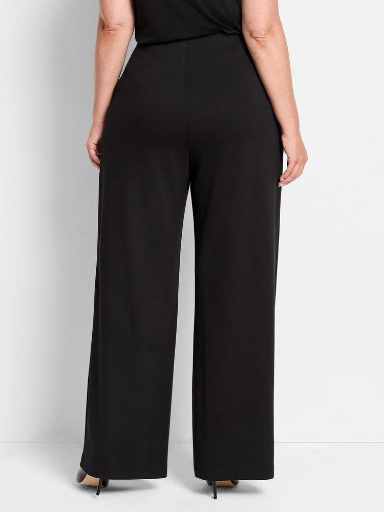 Black wide-leg pants; high-waisted, straight legs.