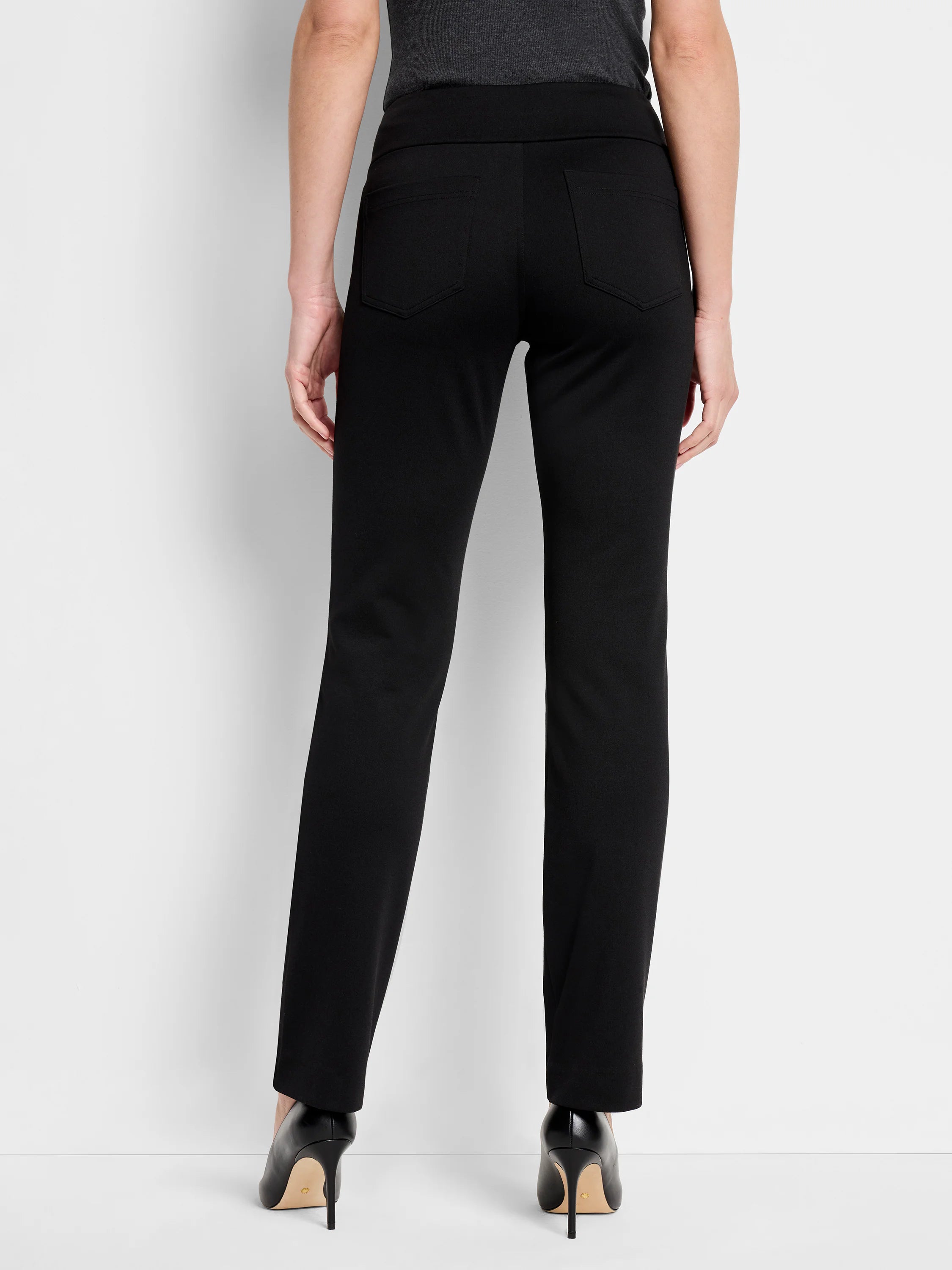 Black knit straight-leg pants with a wide waistband and two back patch pockets.