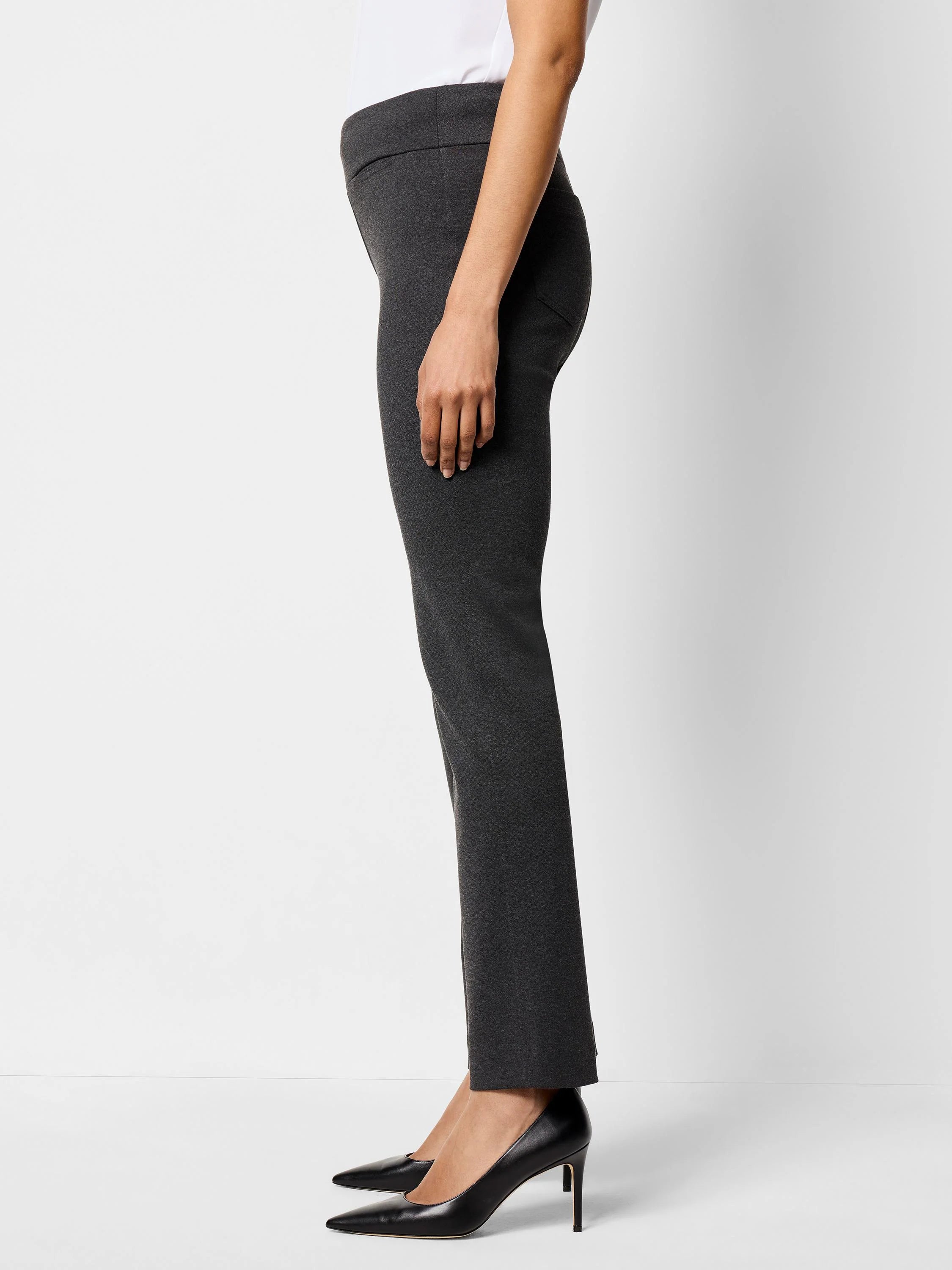 Dark gray knit pocket pants feature a wide, flat waistband and straight leg, shown from the side.