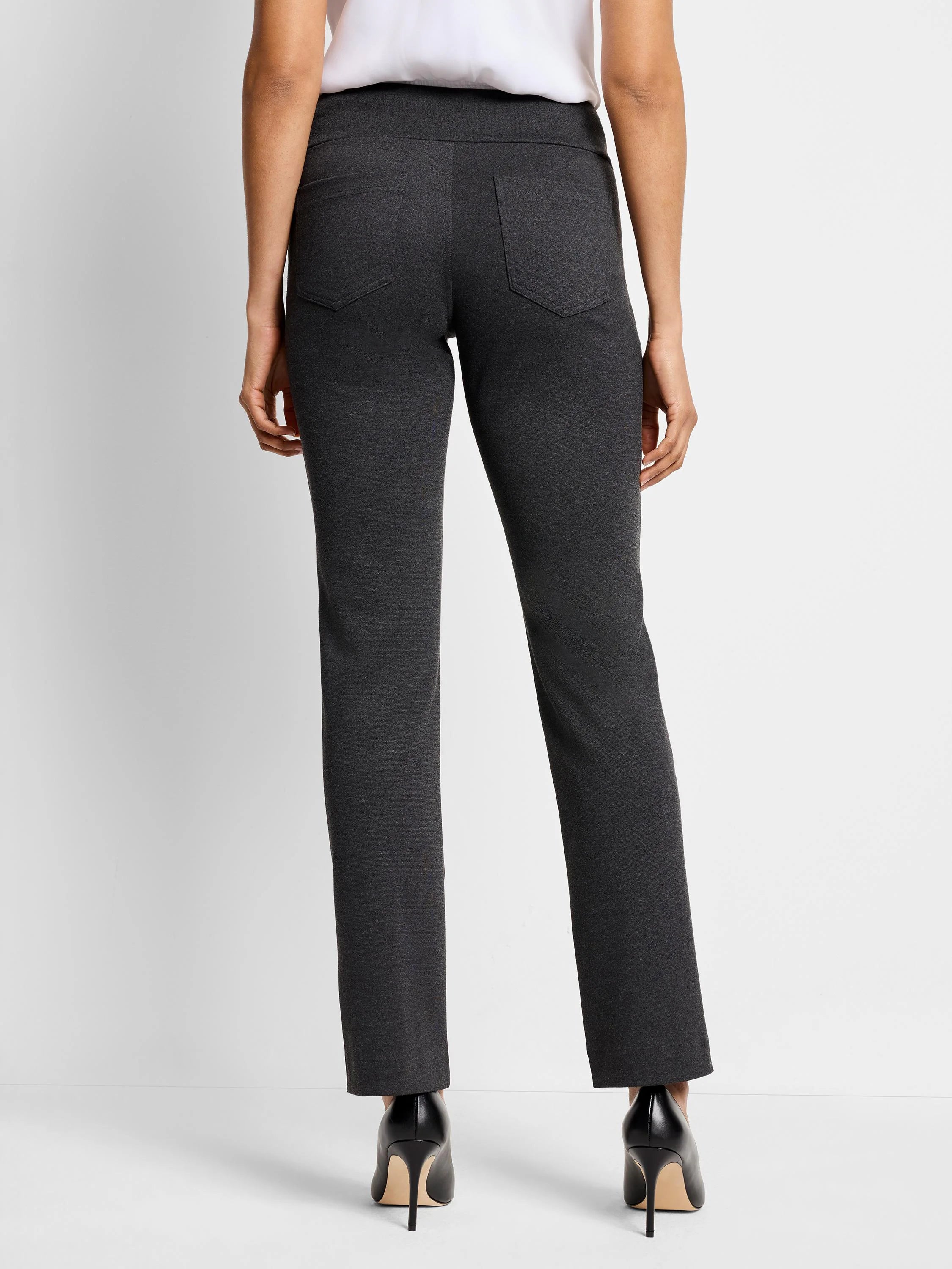 Dark gray knit pants, straight-leg with two back patch pockets, shown from the back on a model.