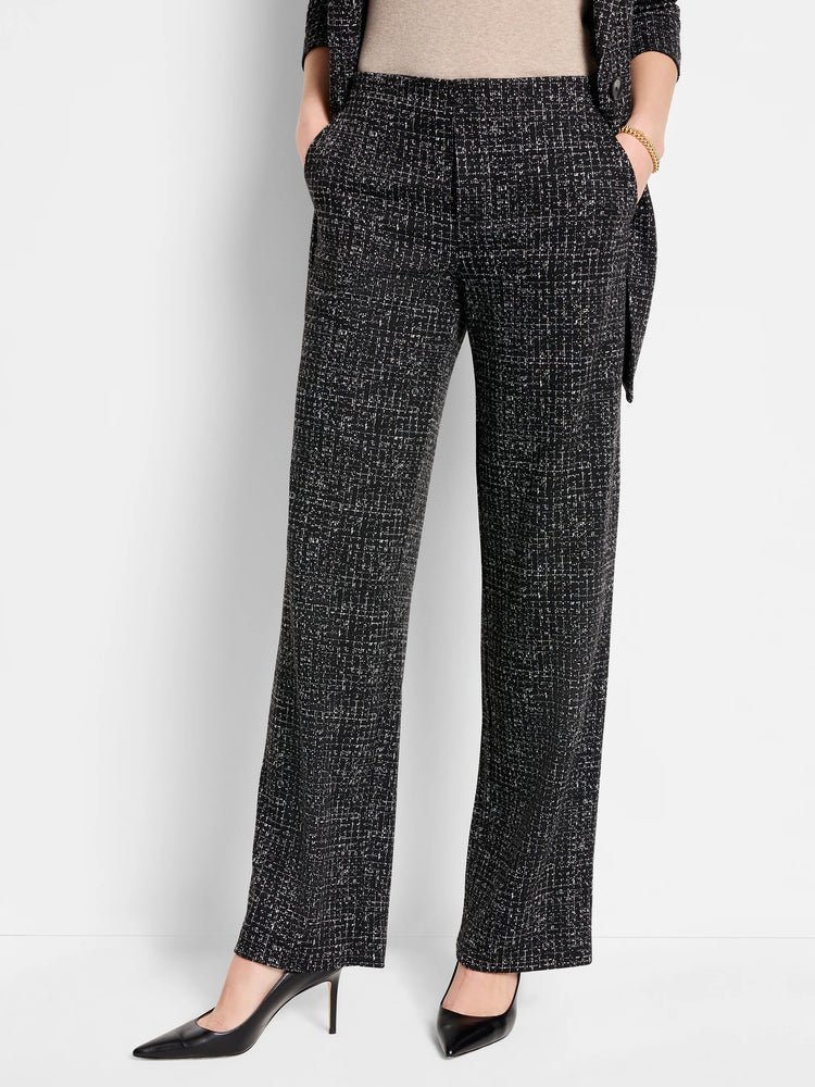 Black wide-leg pants with a small white grid pattern. Pockets visible.