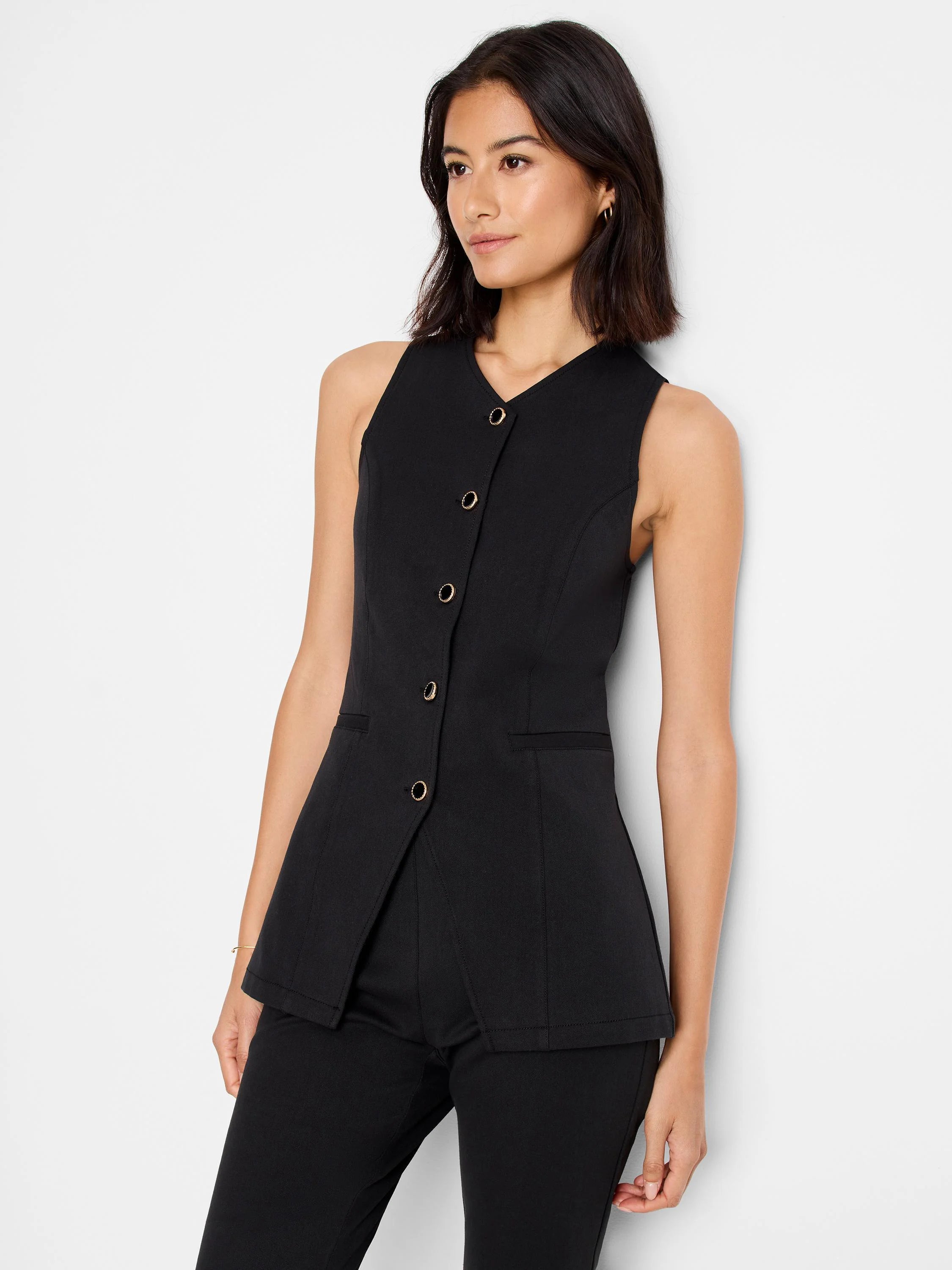 Black sleeveless vest, button front, split hem, gold buttons.