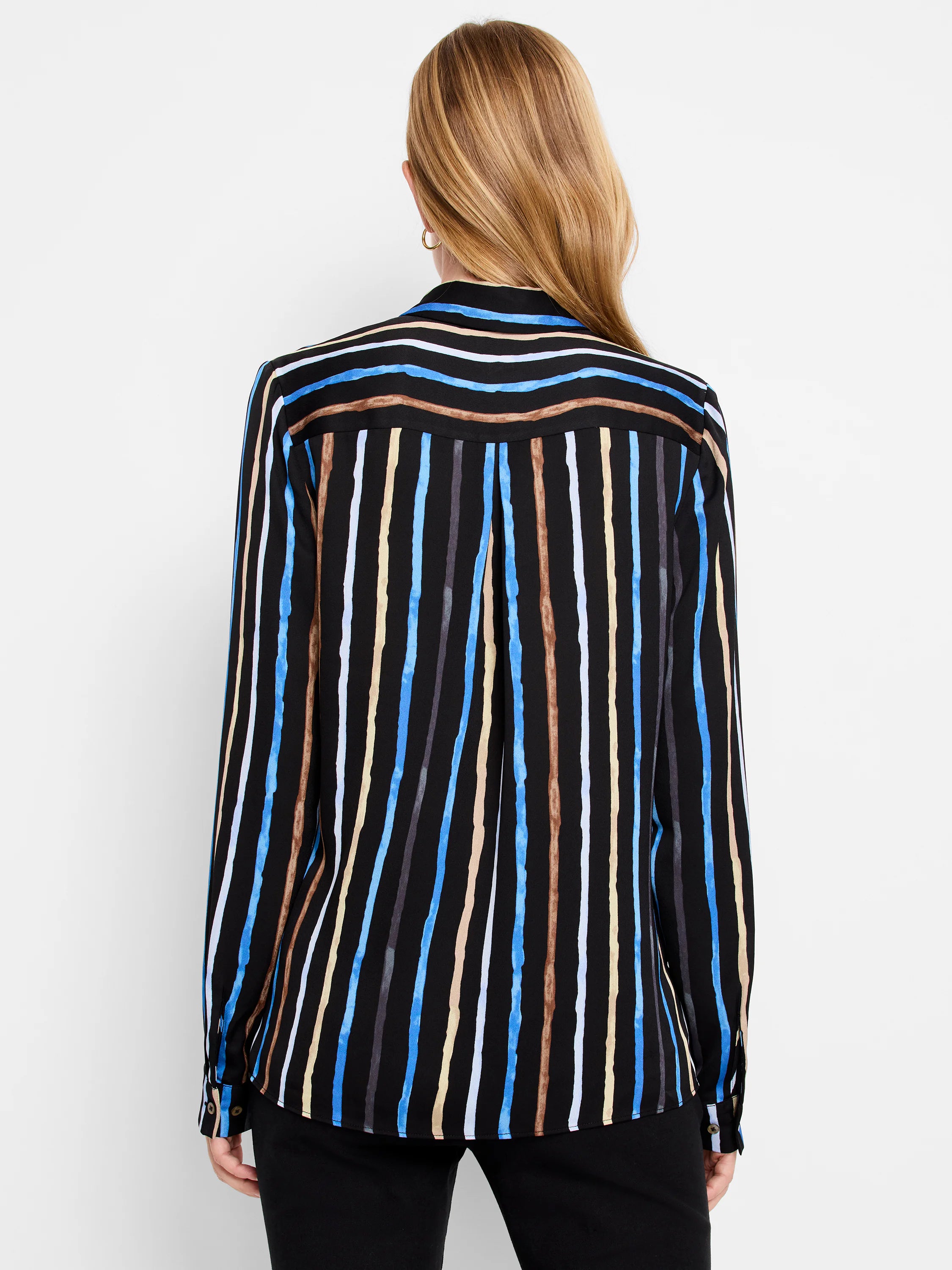Black top with vertical stripes in blue, tan, and gray. Long sleeves.