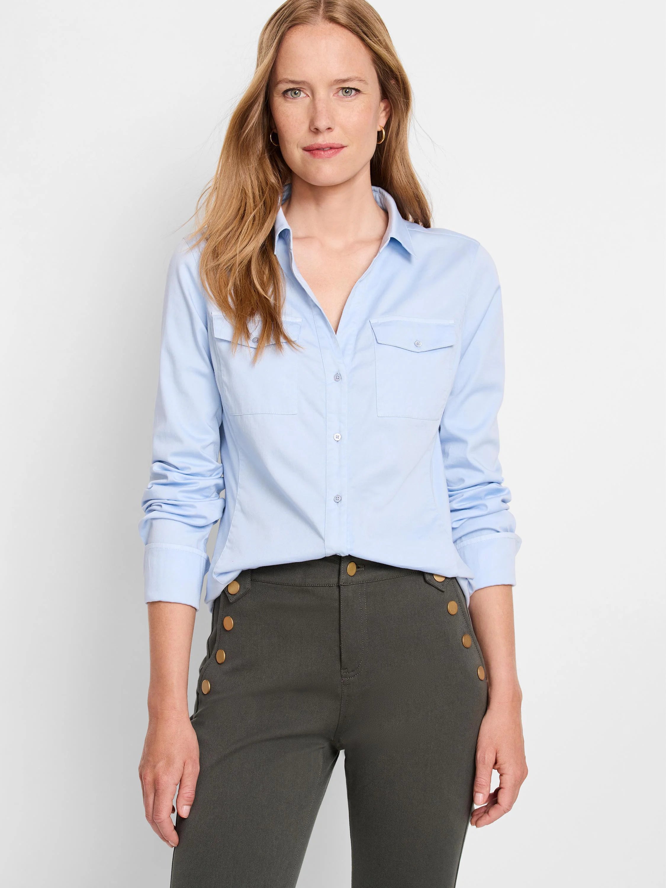 Light blue long-sleeve button-down shirt; two chest pockets. Gold buttons.