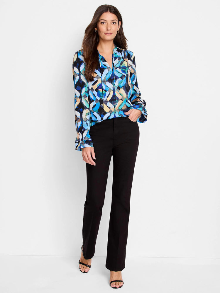 Long-sleeve blouse, blue, teal, black, and beige abstract print. V-neck, ruffled cuffs.