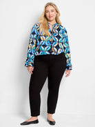 Here's alt text for the image, under 125 characters:
"Wave Links Top: Blue, teal, and beige abstract print, long sleeves...