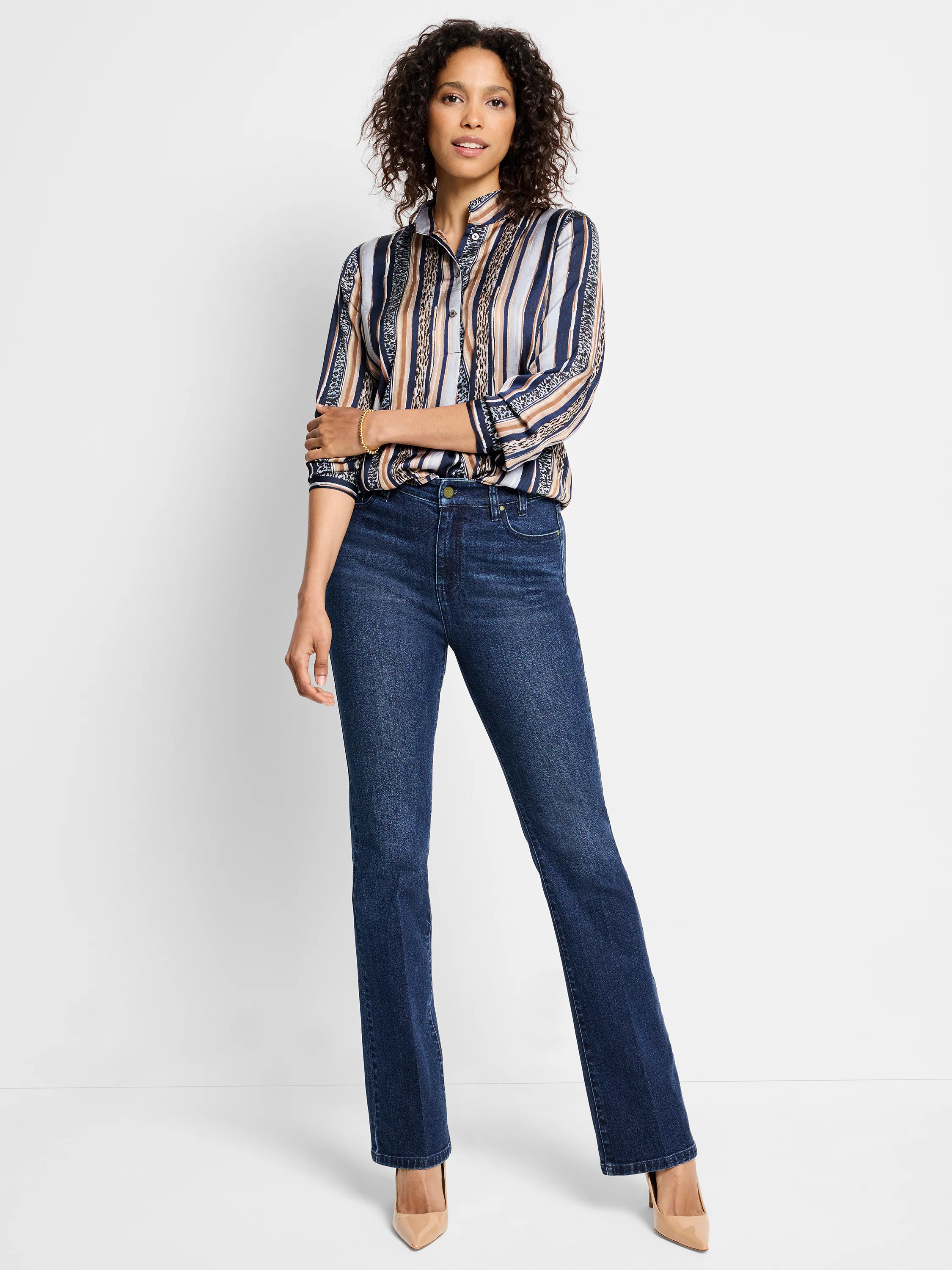 Blue, beige, and brown vertical stripes; animal print accents. Long sleeve button-down shirt.