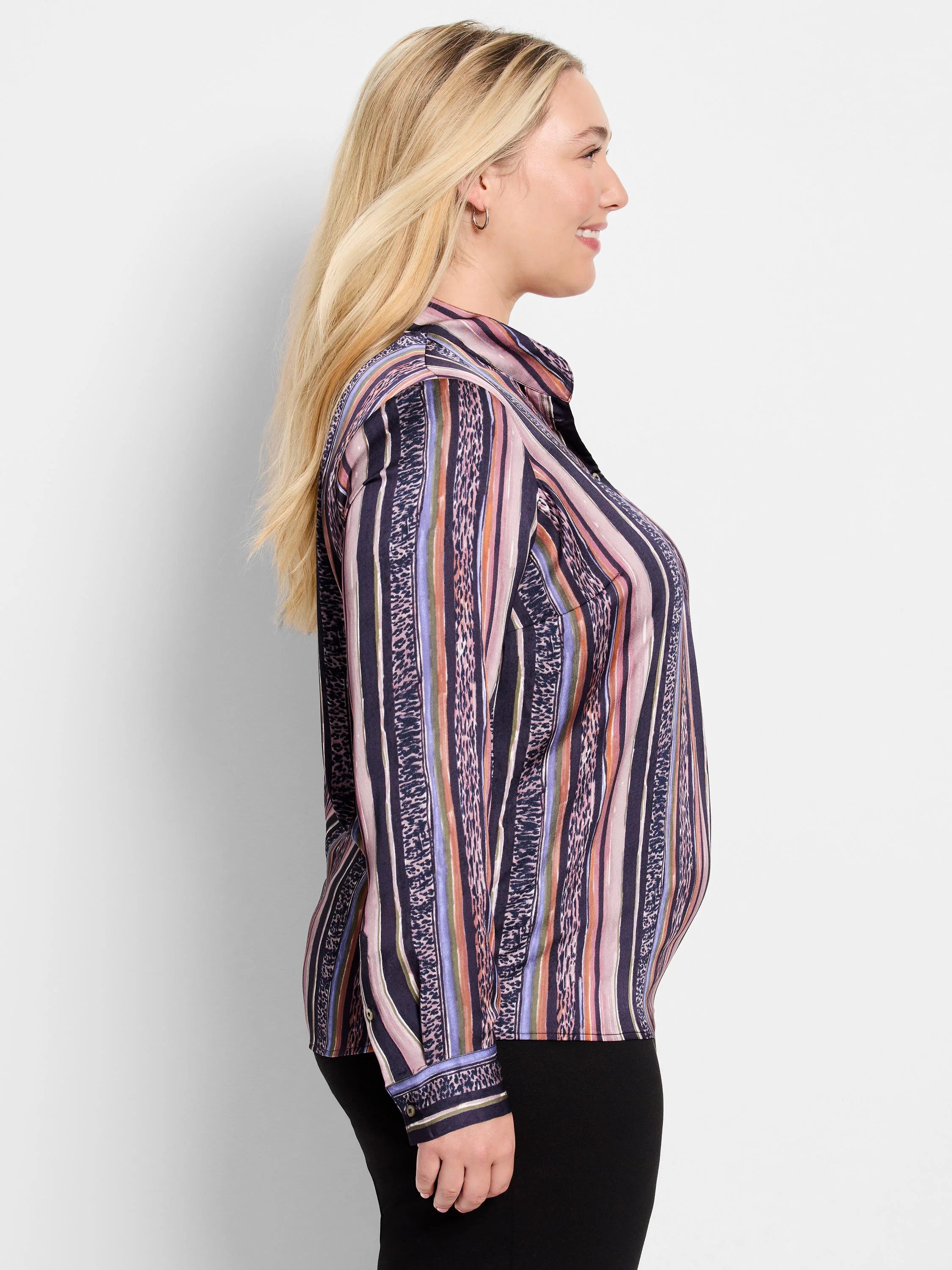 Long-sleeve button-up shirt. Vertical stripes in dark purple, pink, orange, and green, with animal print accents.