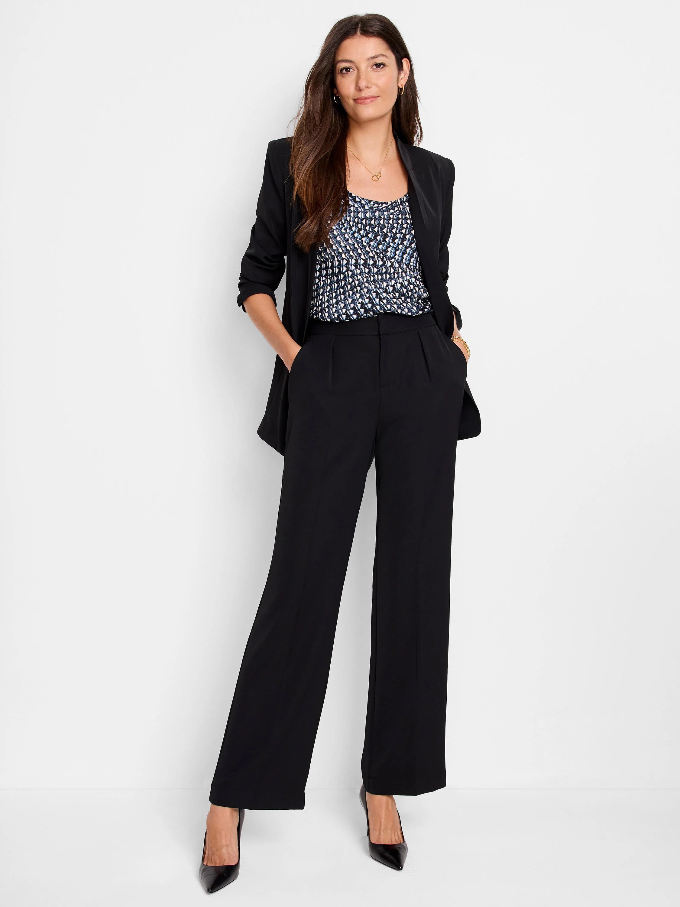 Black cami with blue and white geometric print. Features a scoop neck.