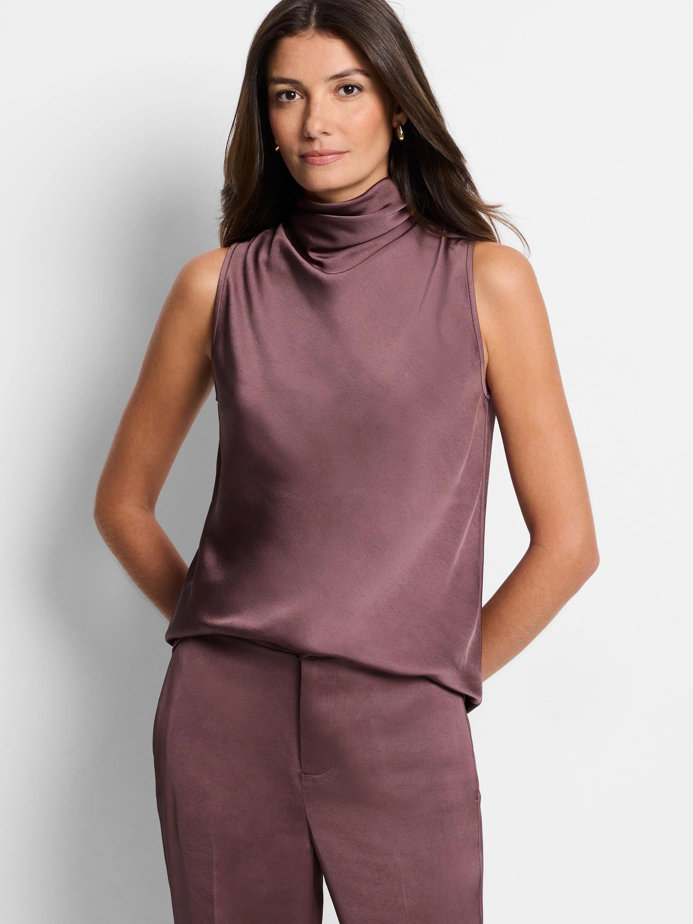 Mauve sleeveless satin top; cowl neck; smooth, shiny fabric.