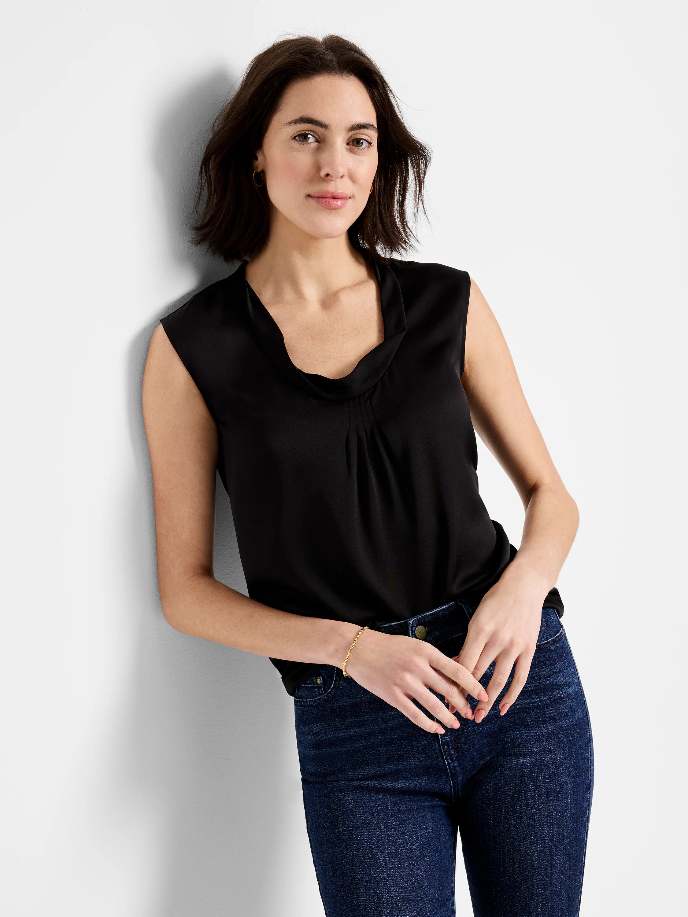 Black sleeveless cowl-neck jacket.  Satin-like sheen.