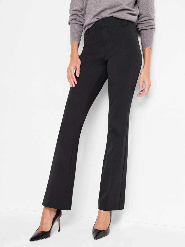 Black, bootcut pants shown on a model. The pants are mid-rise and have a straight leg that flares slightly at the ankle.