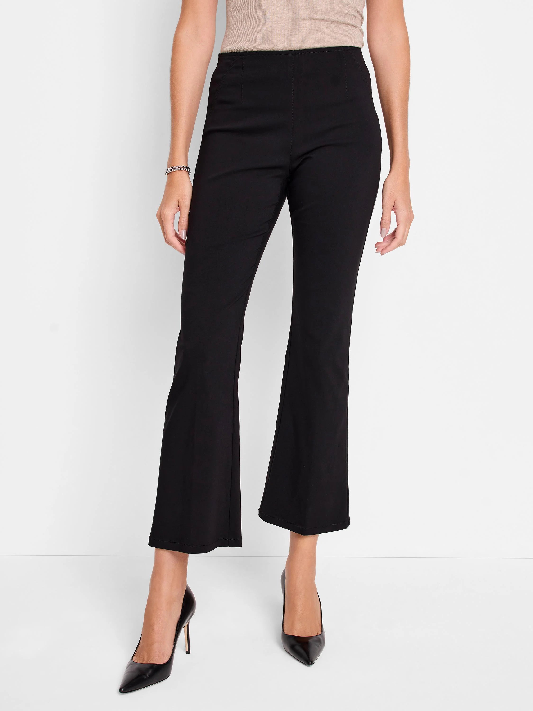 Black bootcut pants; pull-on style; mid-rise waist.