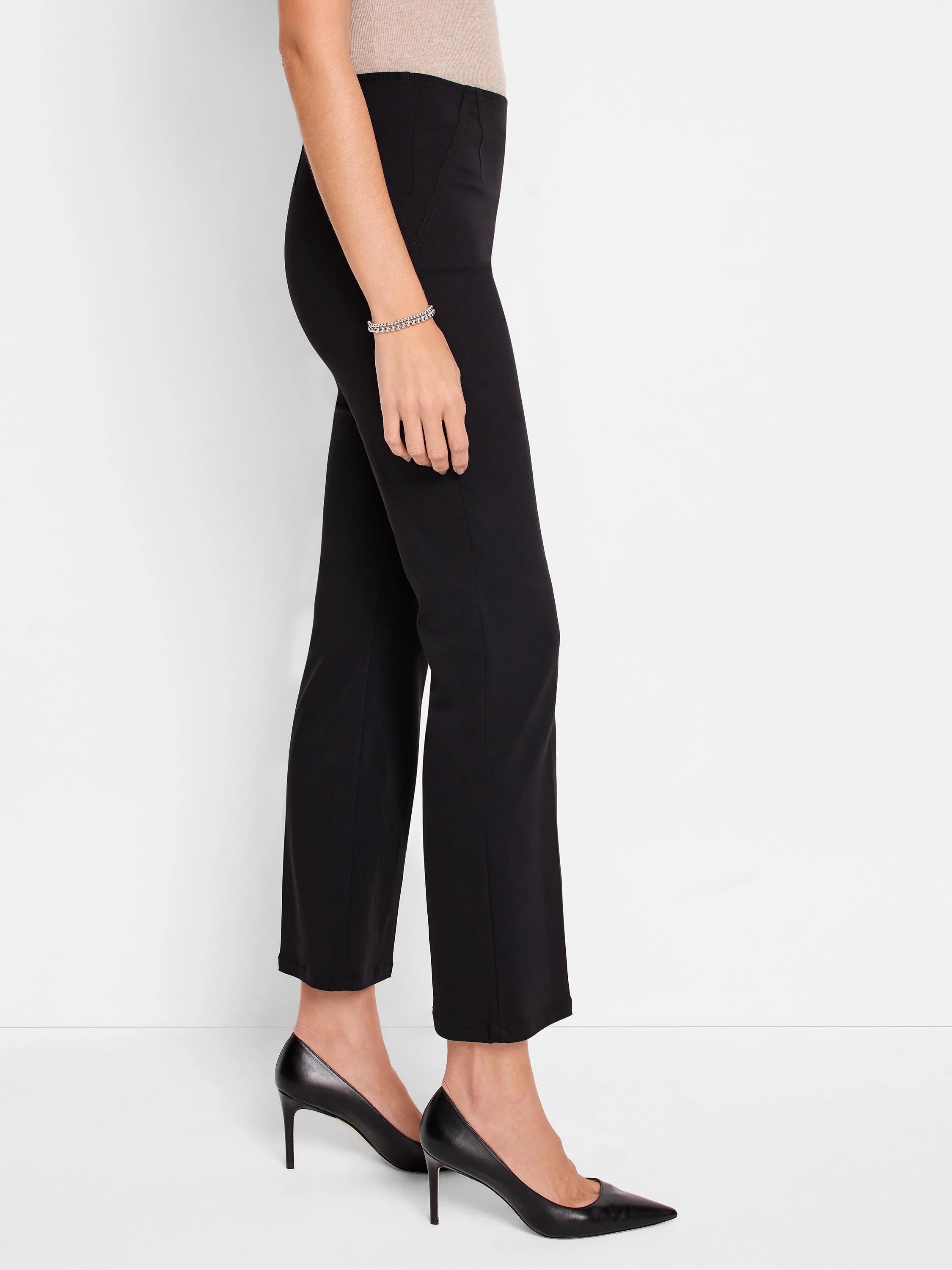 Black bootcut pull-on pants shown on a model. The pants are mid-calf length.