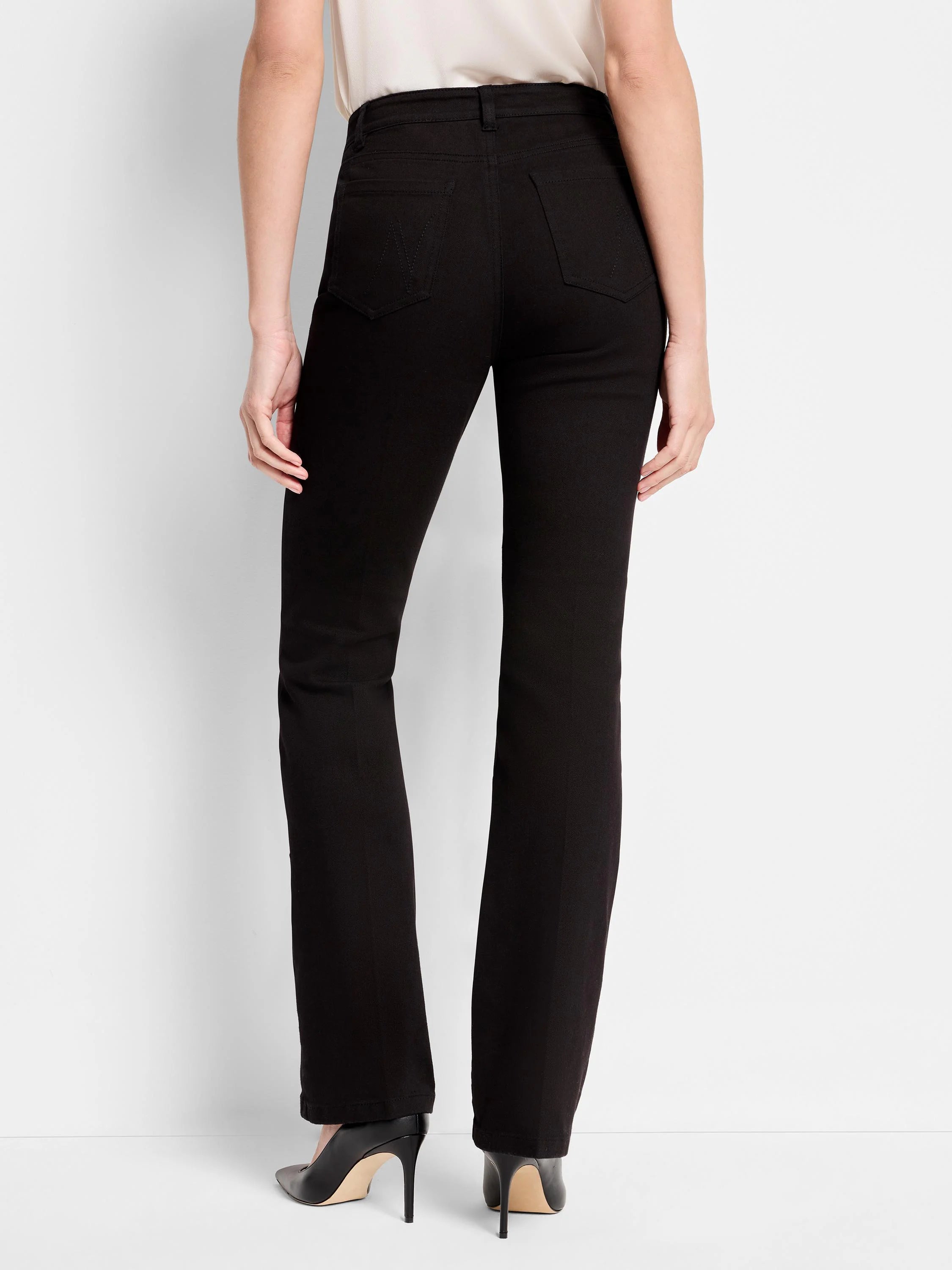 Black bootcut jeans; high-rise waist; back view.