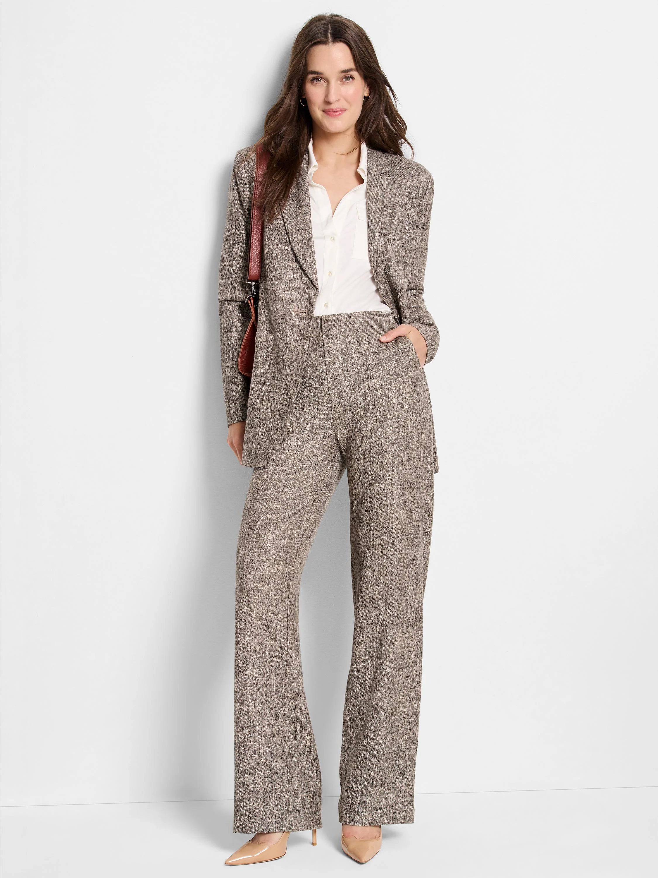 Wide-leg pants; taupe tweed fabric with subtle flecks of beige and brown; model shown wearing them.