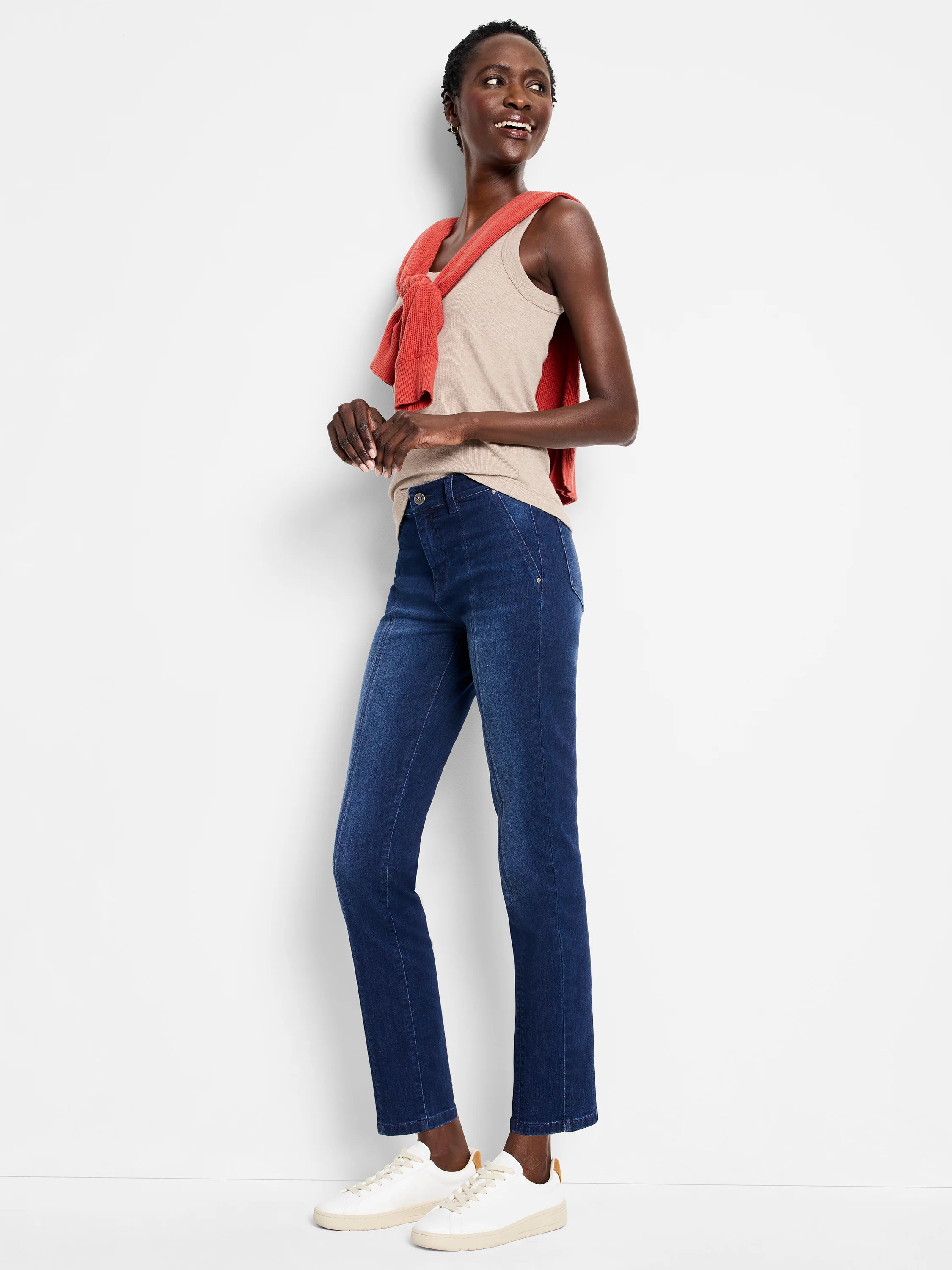 Dark blue straight carpenter jeans. Uniform dark wash, straight leg, with visible angled front seams.