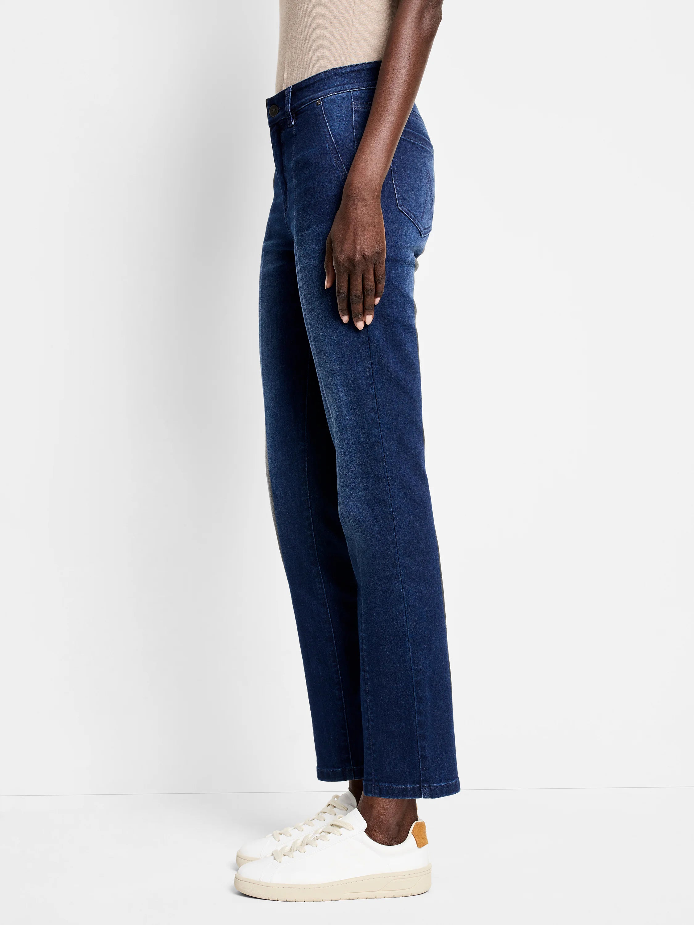 Dark blue, straight-leg carpenter jeans with visible side seams, cropped at the ankle.