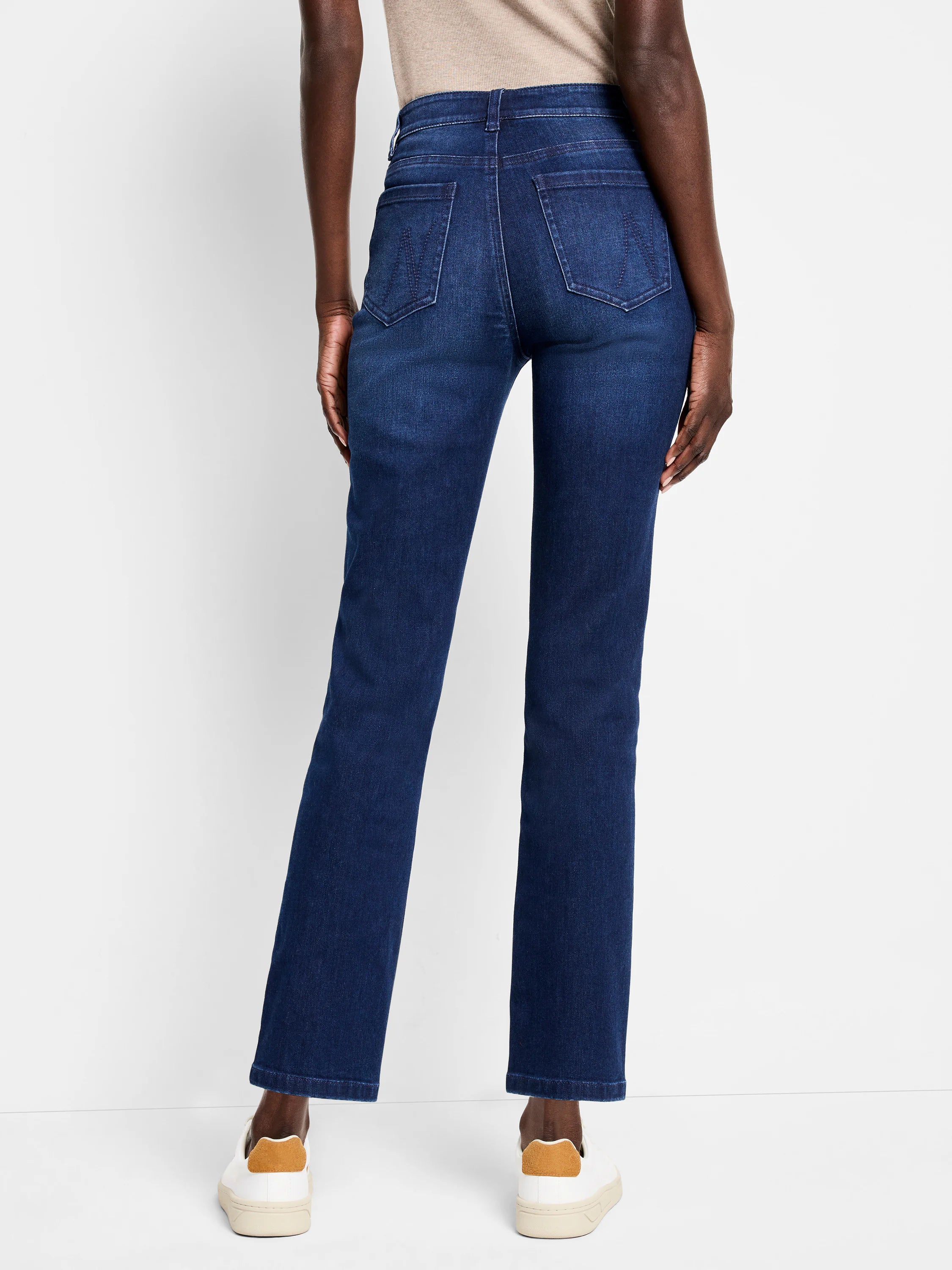 Dark blue straight leg jeans, viewed from the back. Features two back pockets with stitched designs, belt loops, and an...