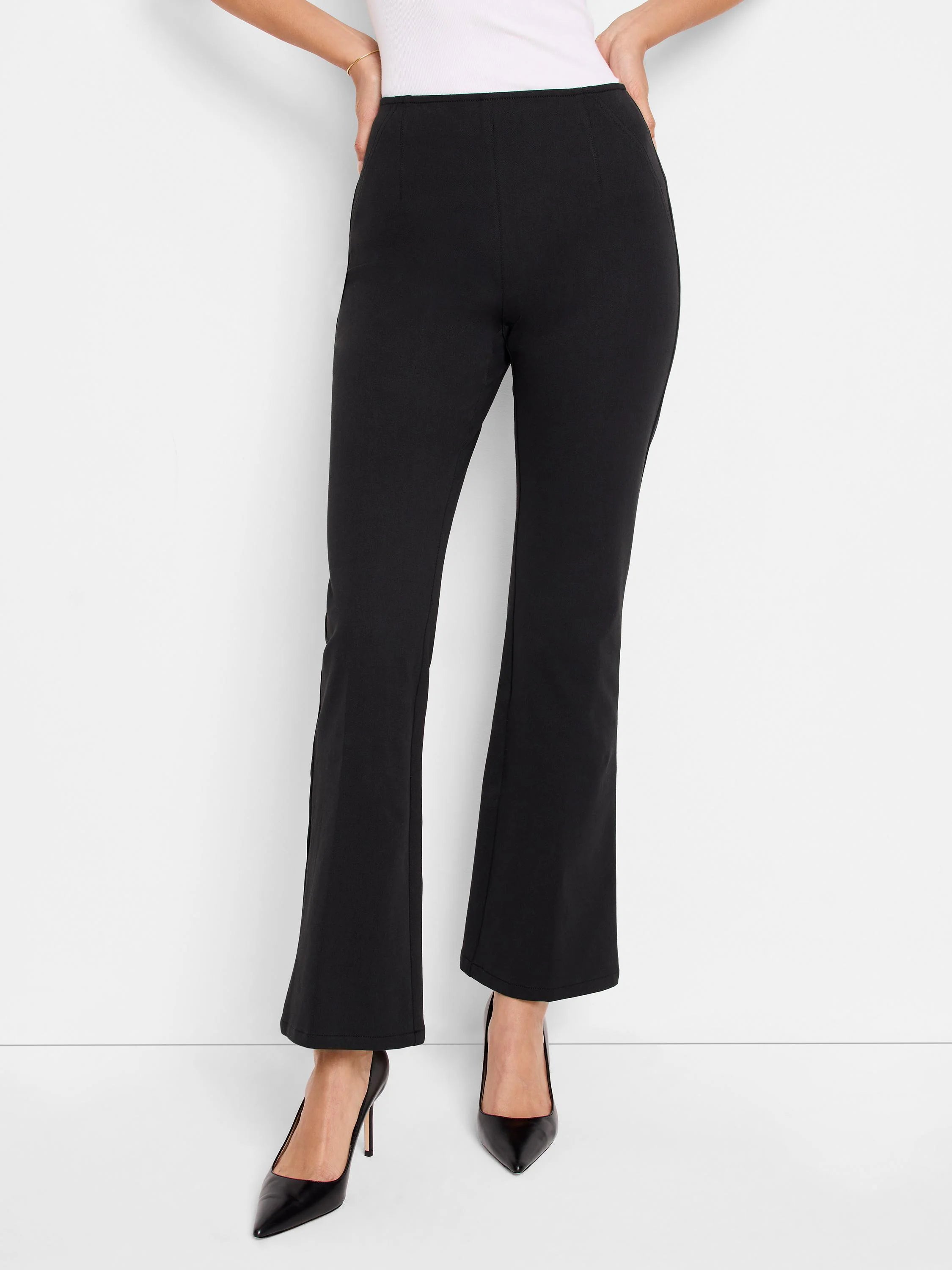 Black bootcut pants; pull-on style. Slight flare at ankle.