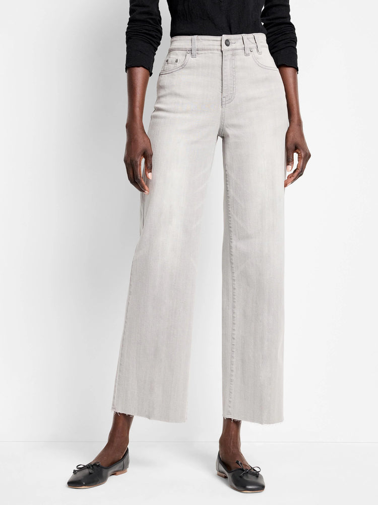 Light grey, wide-leg, cropped jeans with raw frayed hems.