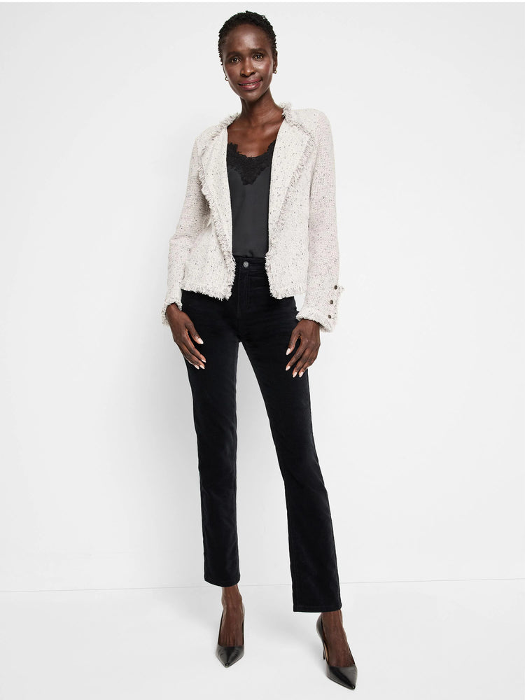 Black velvet straight-leg ankle pants on a model.