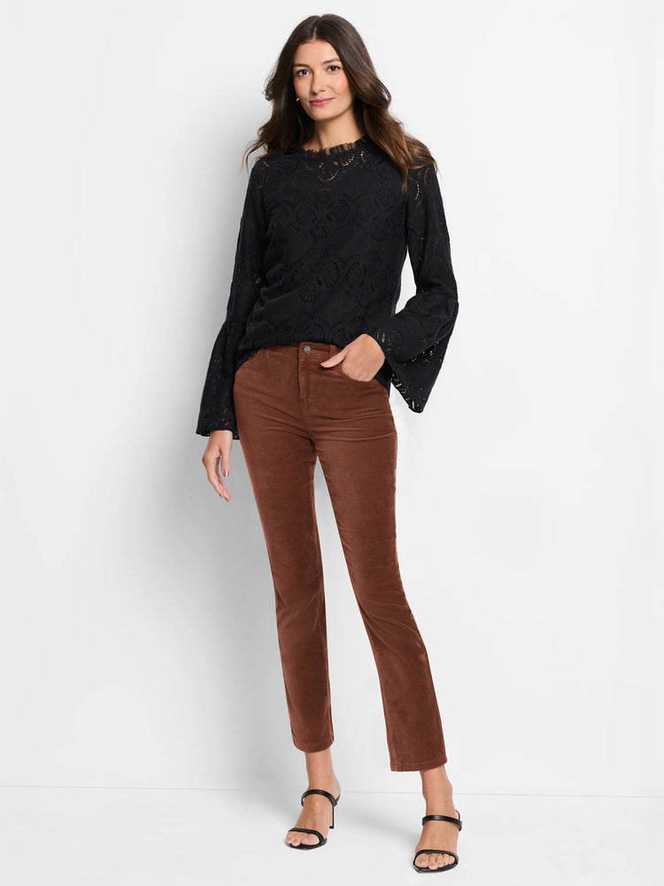 Brown velvet ankle pants; straight leg. Model also wears black top.