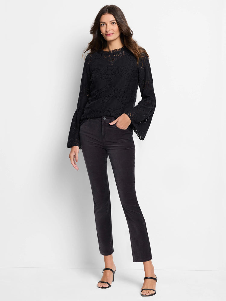 Dark gray velvet ankle pants, straight leg. Model wears them with black shoes and top.
