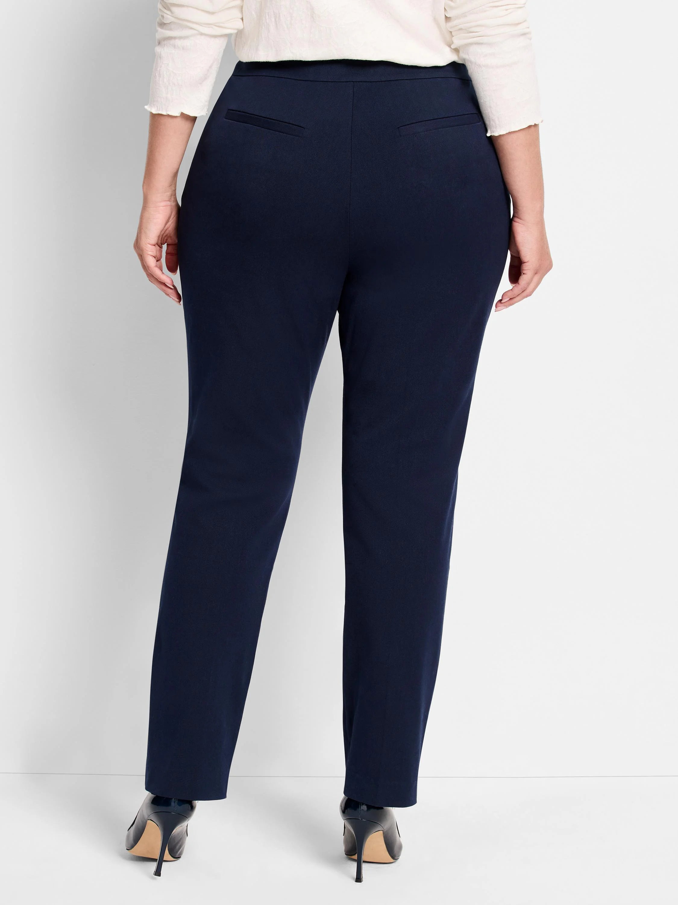Here's alt text that meets the requirements:
"Image shows navy blue straight-leg pants from the back.  They have a...
