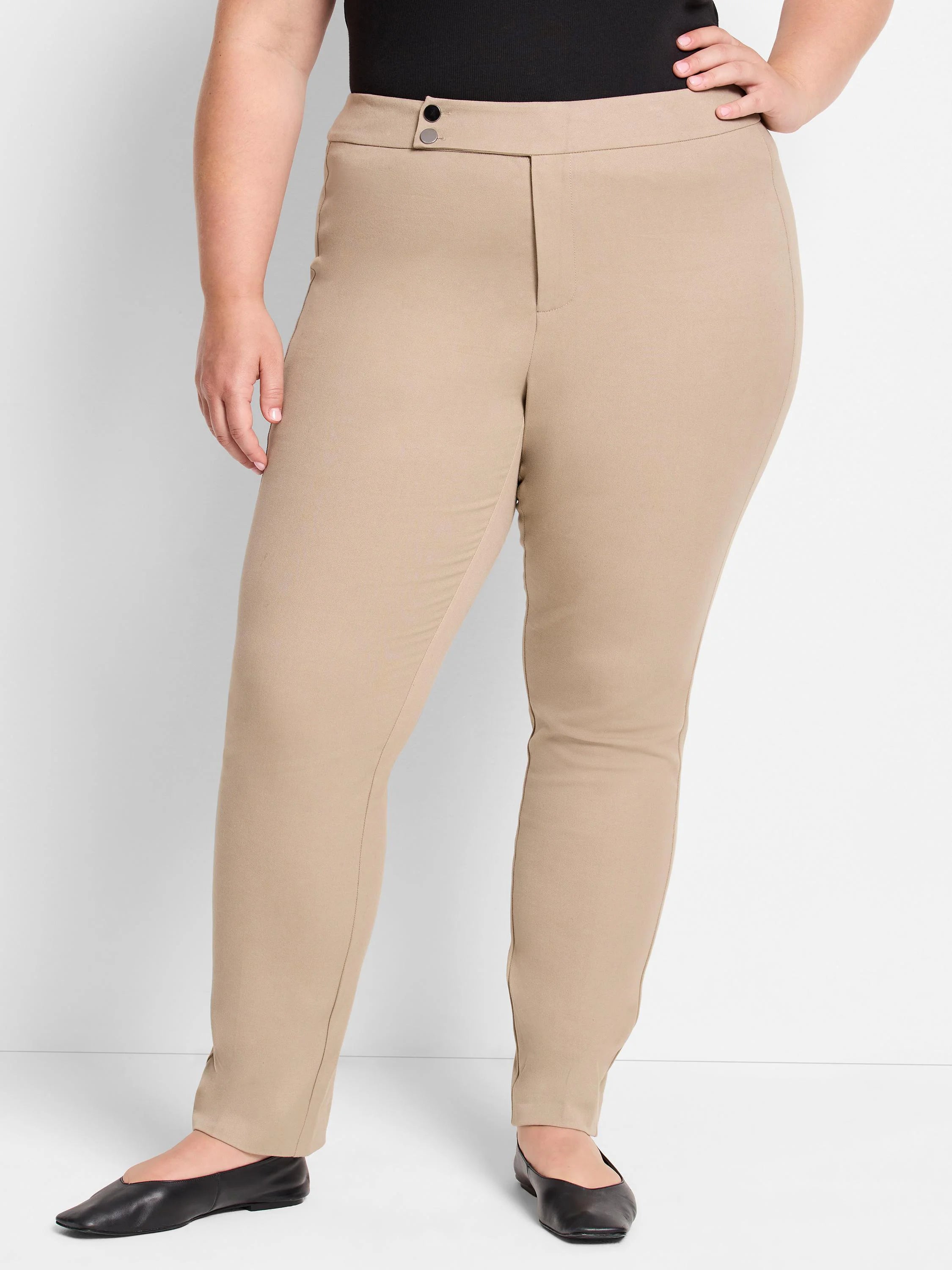 Beige straight-leg pants;  high waist, front zipper, two buttons. Model wearing black flats.