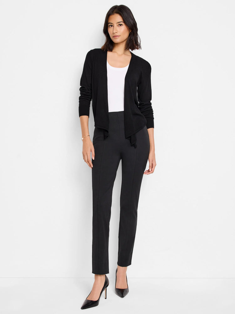 Black slim-leg pants; straight, ankle-length. Model is wearing them with a black cardigan and white top.