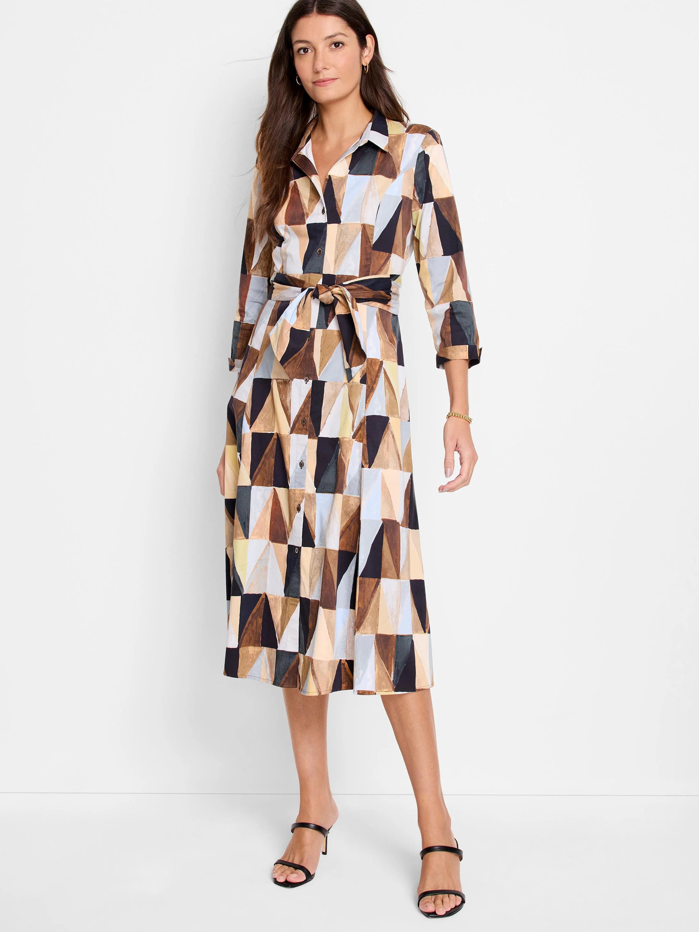 Midi shirt dress with brown, beige, and blue geometric print. Self-tie belt. Three-quarter sleeves.