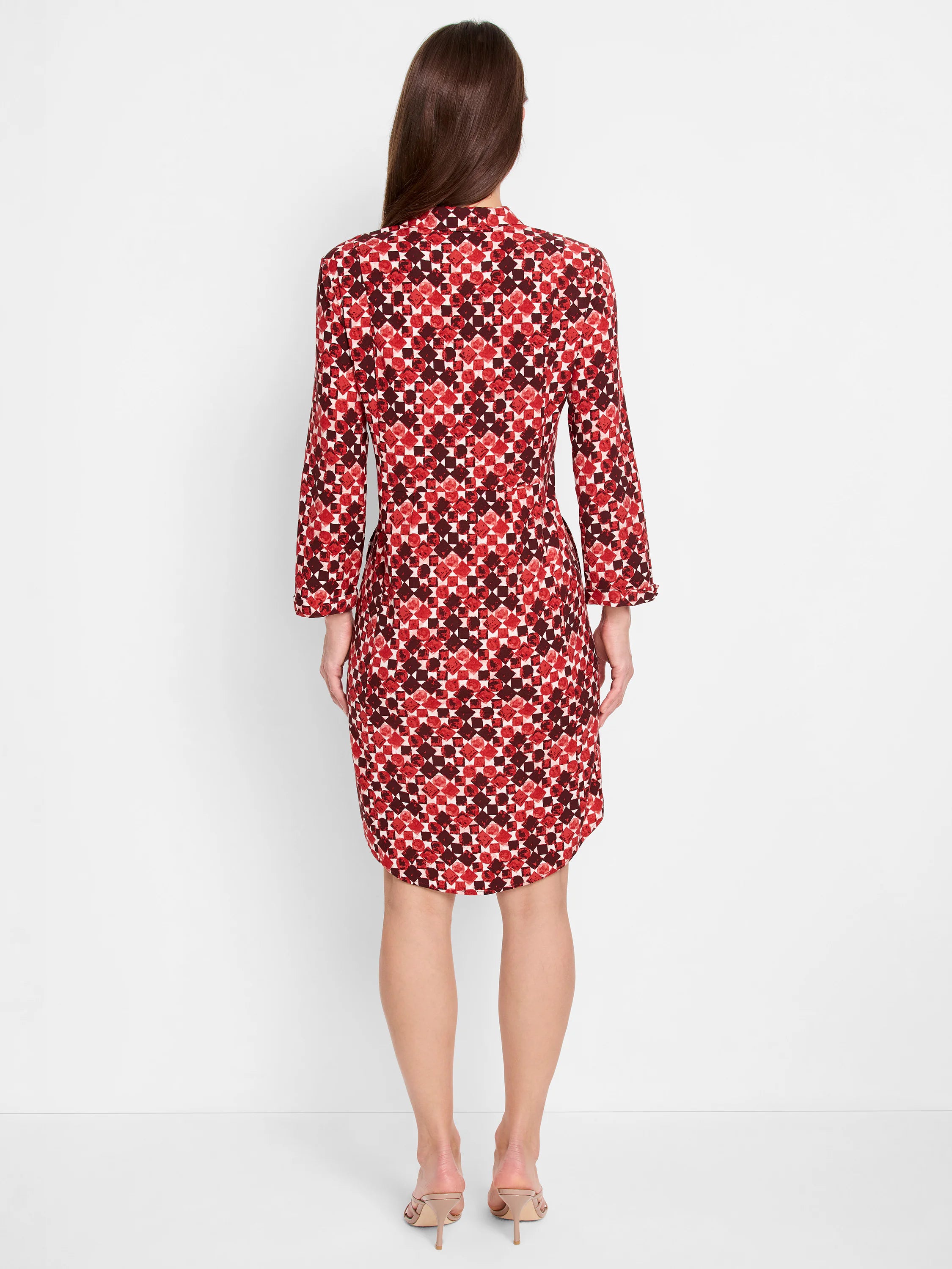 Red and dark brown geometric patterned shirt dress, 3/4 sleeves, knee-length, A-line silhouette.