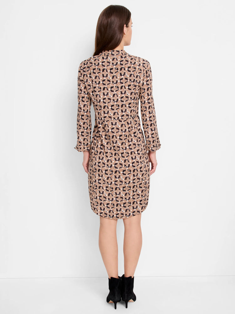 Brown midi dress, black & white geometric print, three-quarter sleeves. Rear view.