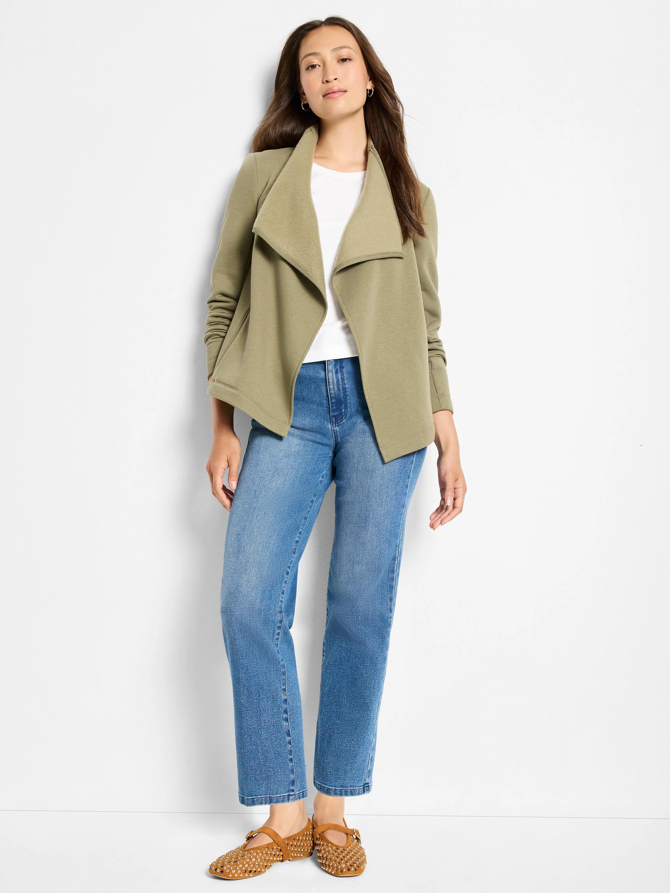 White knit tank top, sleeveless, with a round neck, shown layered.