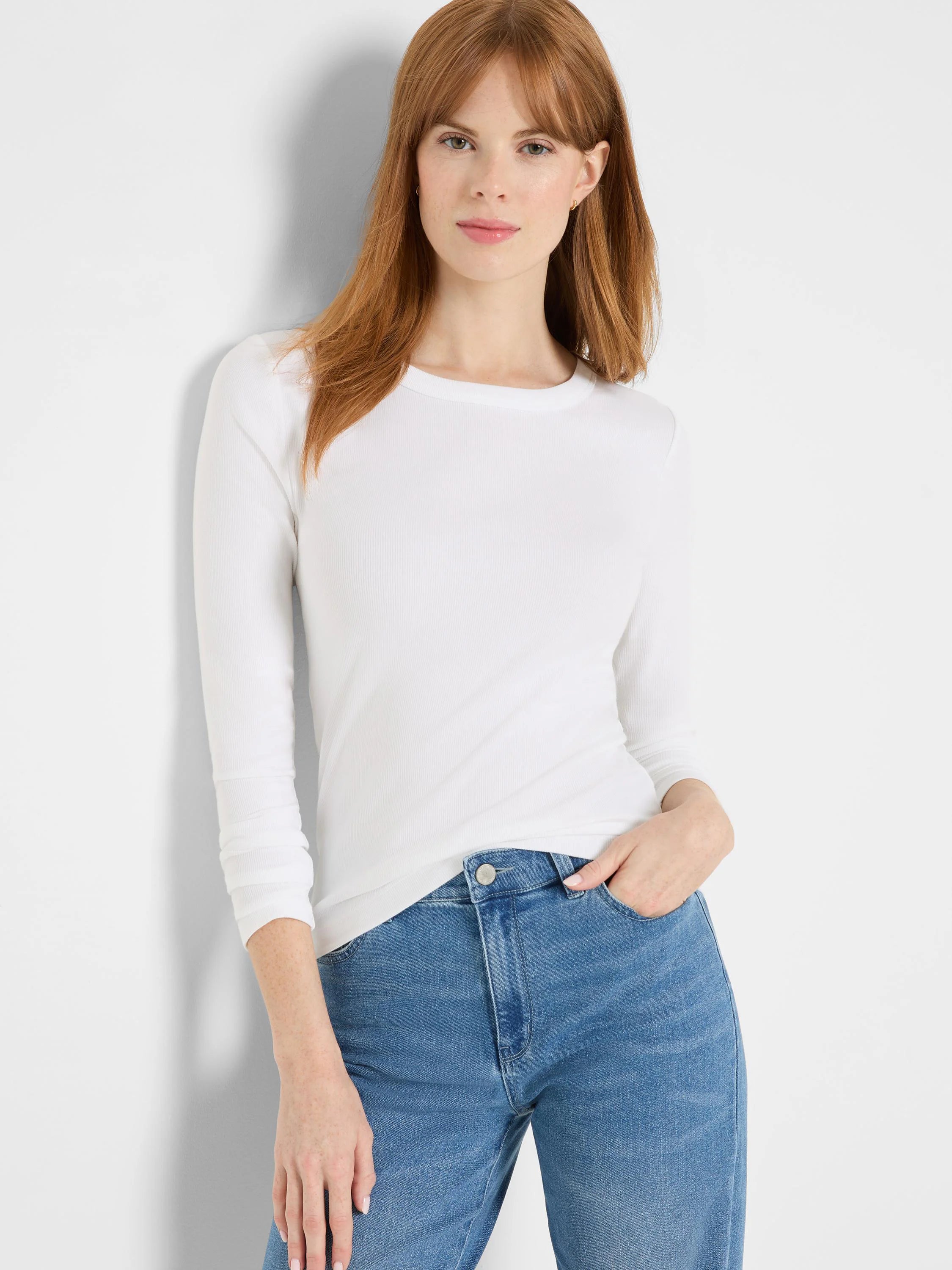 White ribbed knit long sleeve crew neck tee.