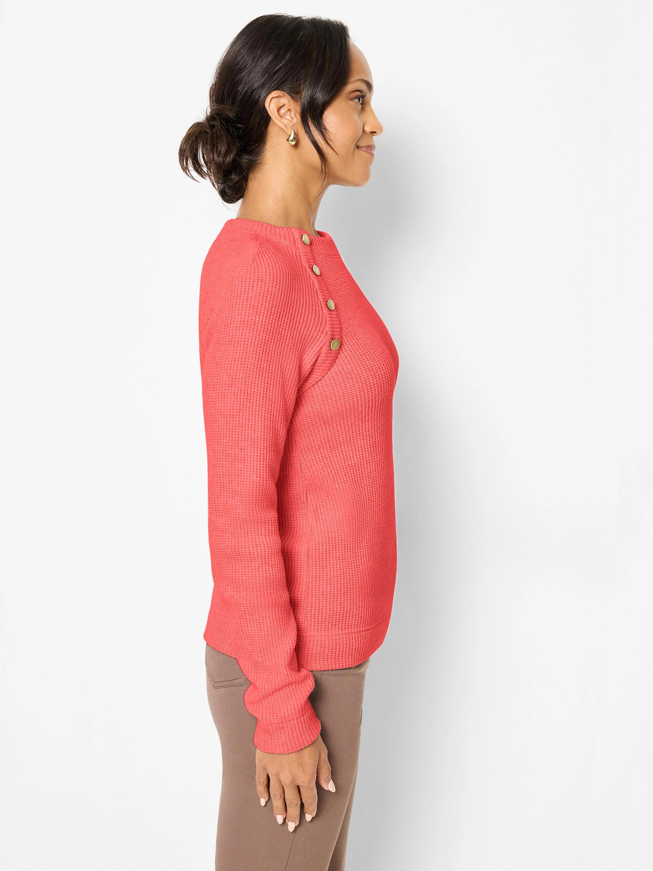 Coral thermal button top, waffle knit texture, with long sleeves and gold buttons on the left shoulder.