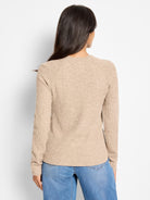 Back view of a light beige thermal top. Features waffle knit texture, long raglan sleeves, and a crew neck.
