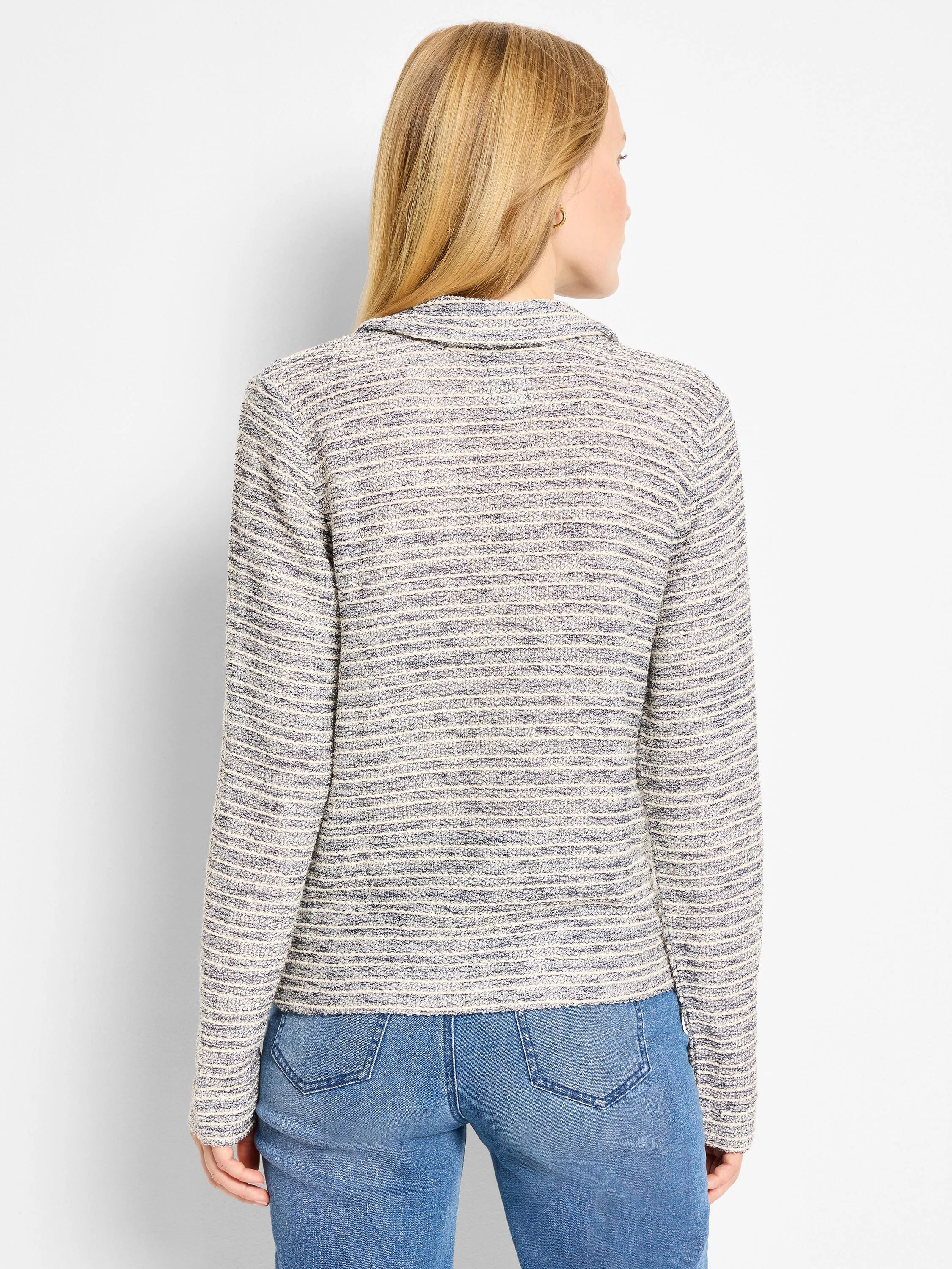 Cream and muted blue rope-textured polo top with horizontal shimmer stripes and a collar. Back view.