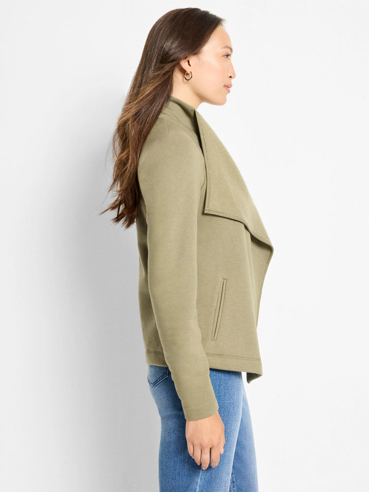 Olive green Lounge Around Moto Jacket on a model. Features a draped collar and vertical slit pocket.