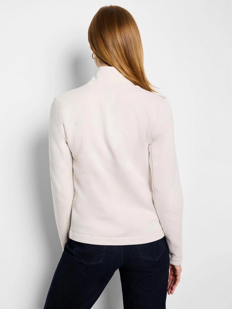 Back of a pale cream, high-neck jacket with long sleeves.