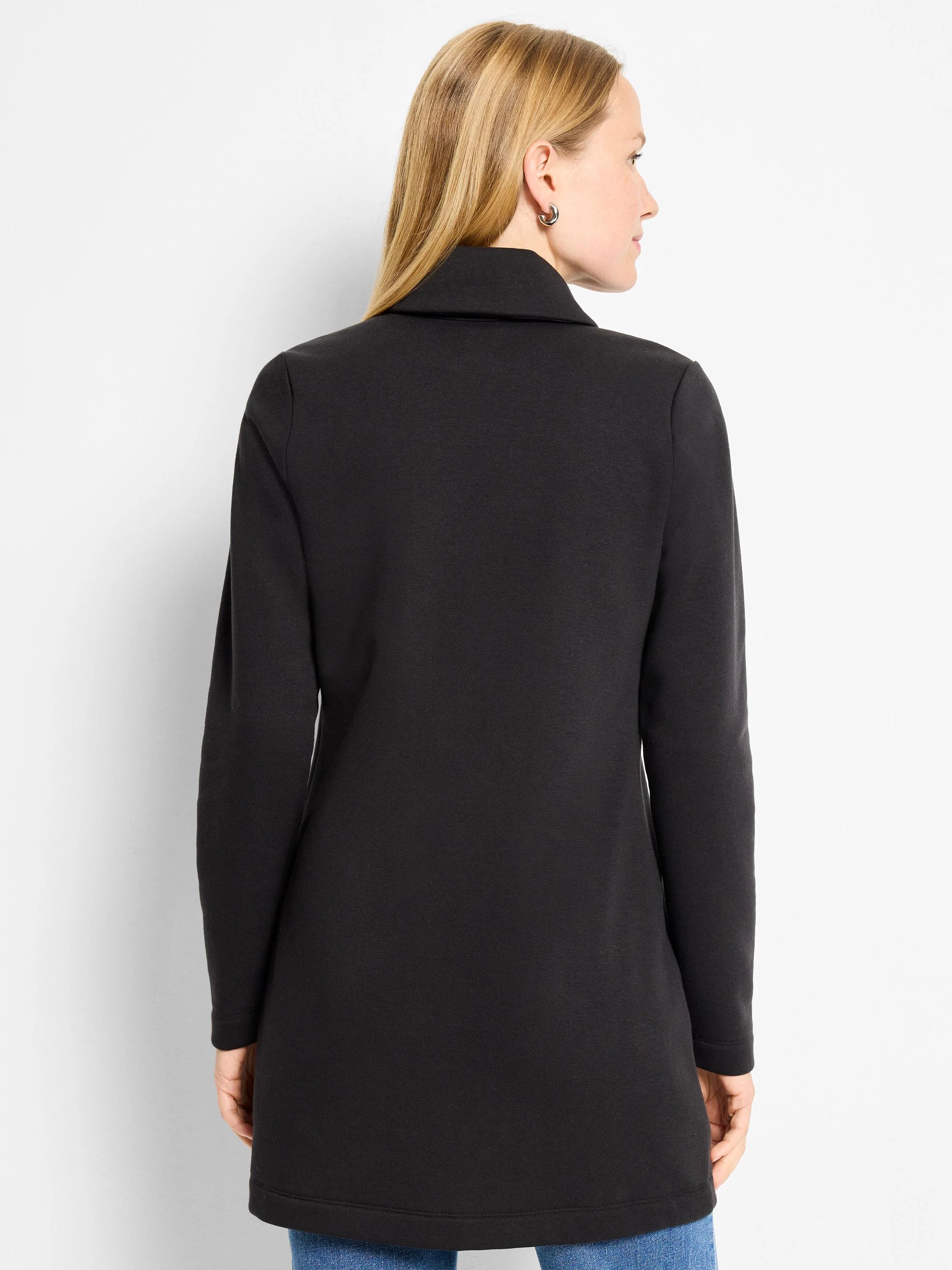 Black About Town Jacket with a high collar, long sleeves, and tunic length, shown on a model from the back.