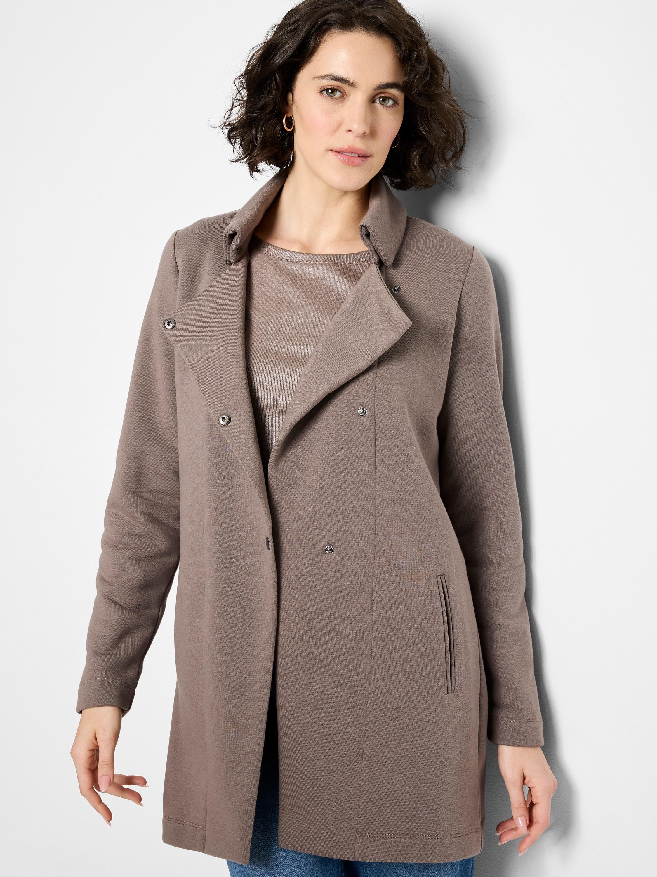 Taupe long-line jersey jacket with wide collar, front snap closures, and vertical slit pockets on front.
