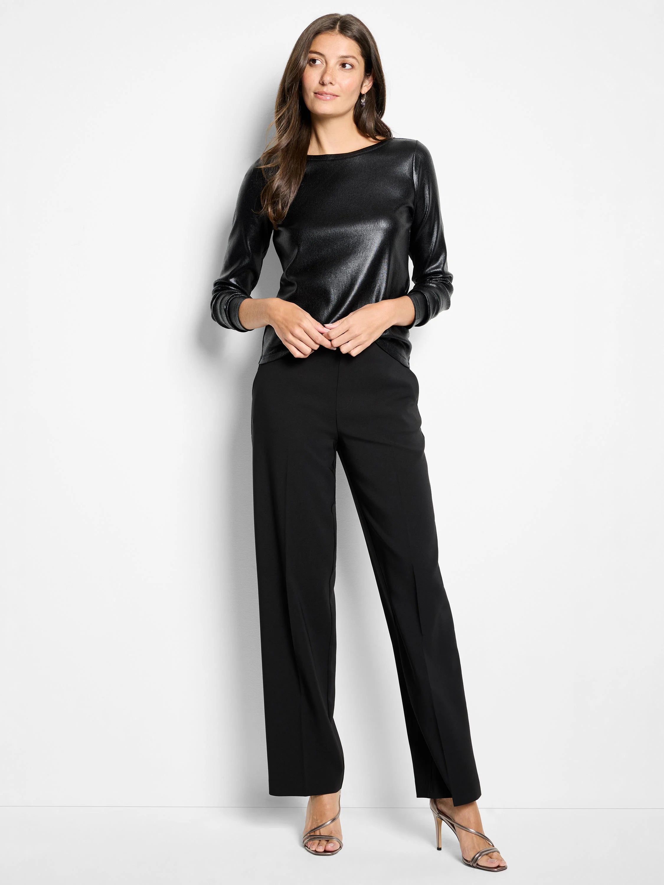Black, long-sleeved shirt; boat neck; subtle sheen.