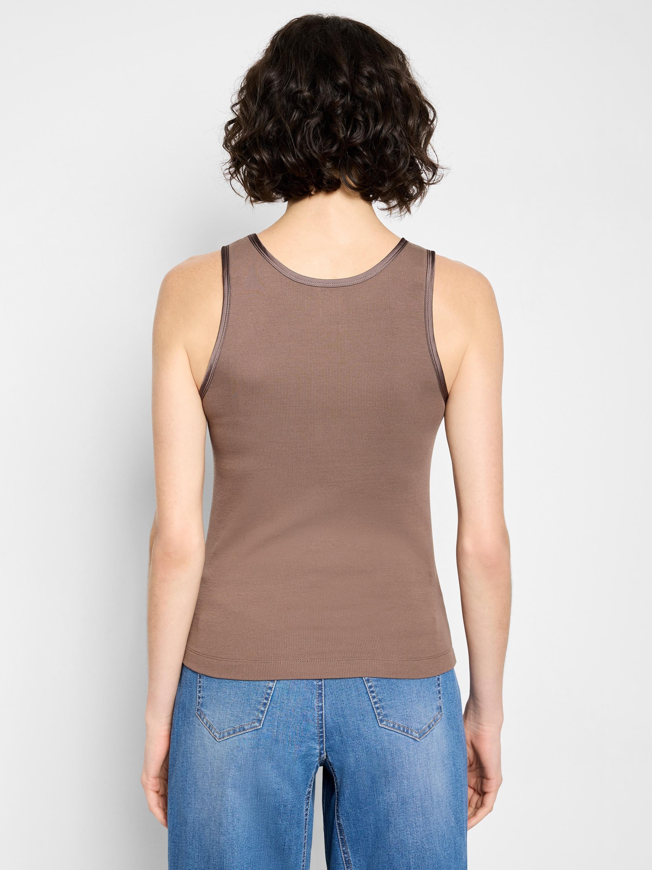 Fitted brown ribbed knit tank top with dark brown trim on neckline and armholes, shown from the back on a model.