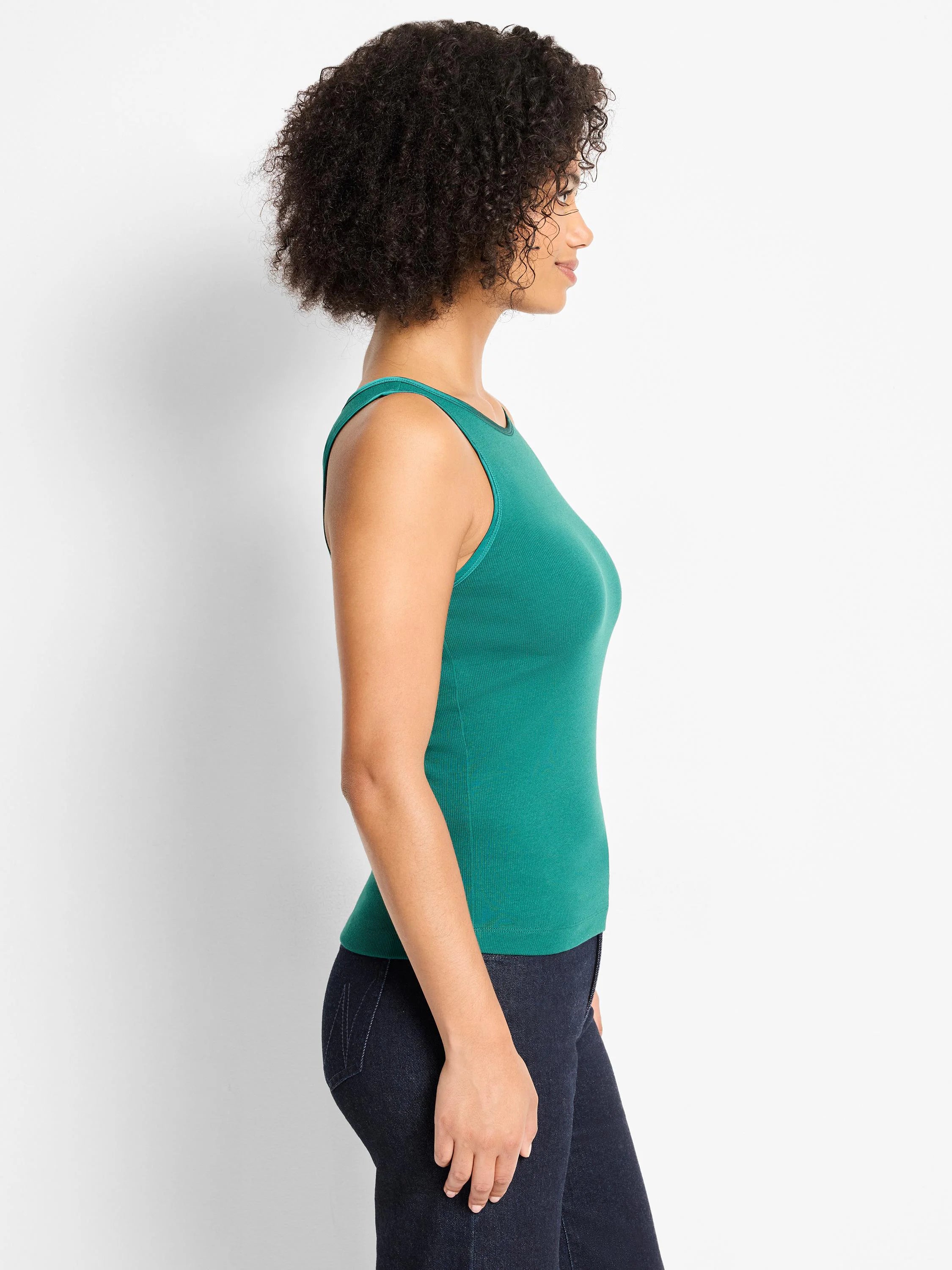 Fitted teal green ribbed knit tank top with rounded neckline, shown on a model.