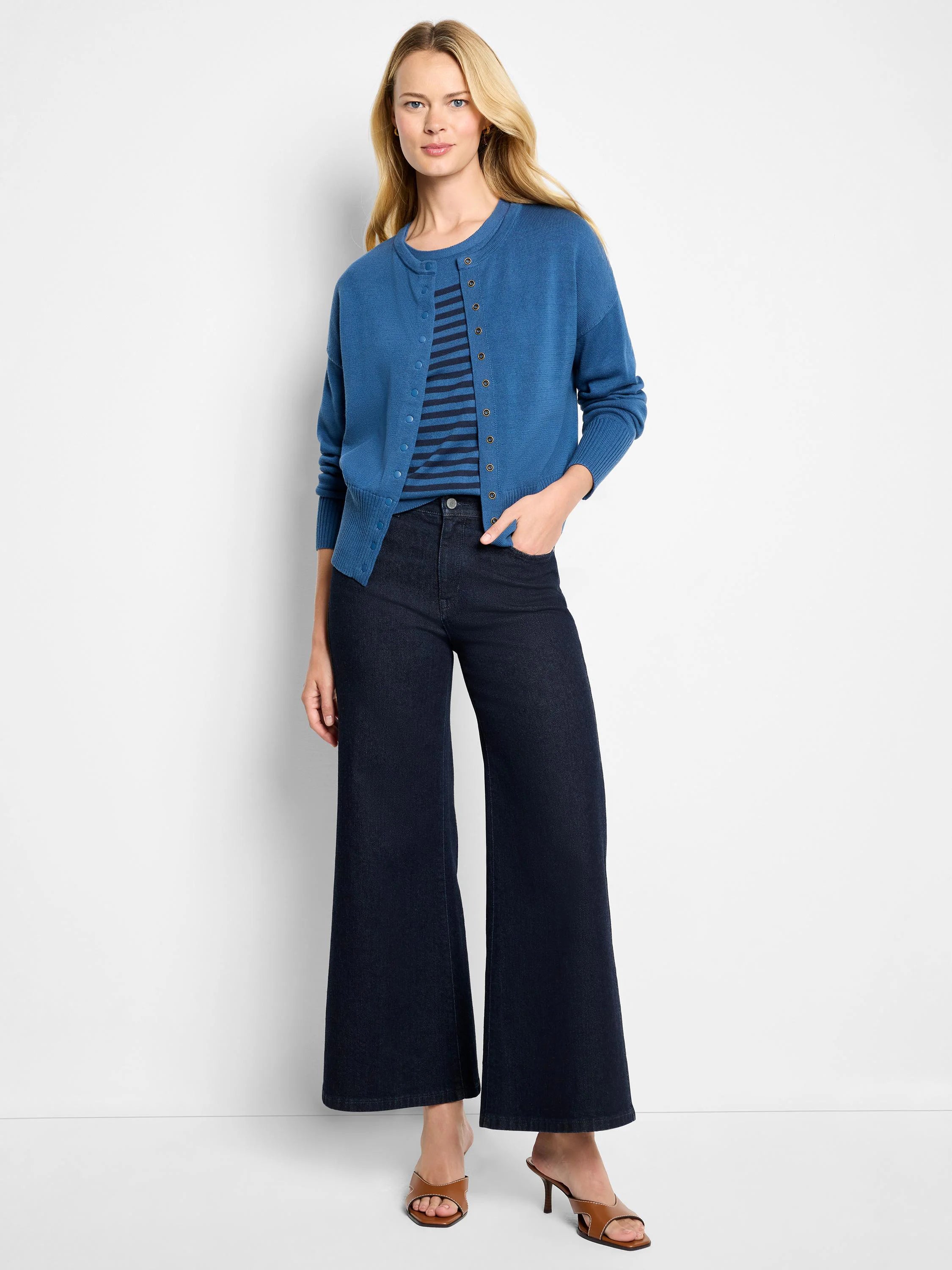 Mid-blue snap-front cardigan with round neck and ribbed details.